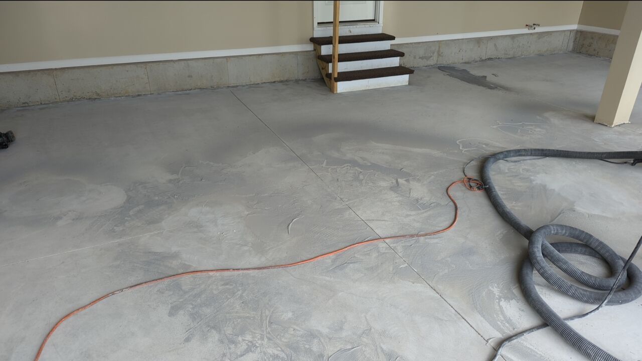 Garage using Cordwood by Select Painting, Coatings & Garage Cabinets