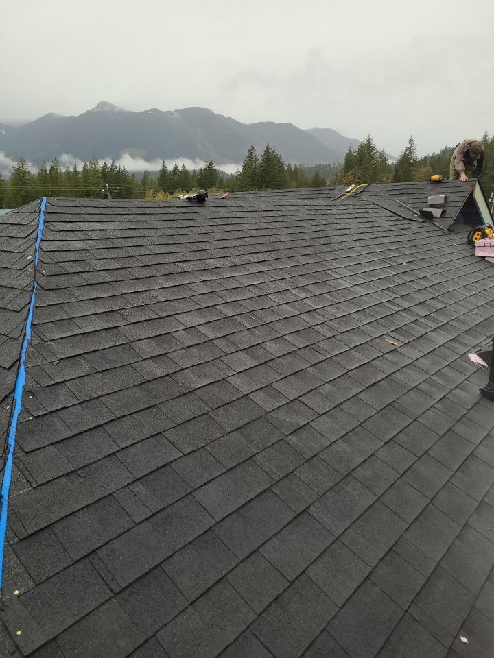 Residential Roofing Installation using OC Oakridge shingles by Top Notch Roofing Inc