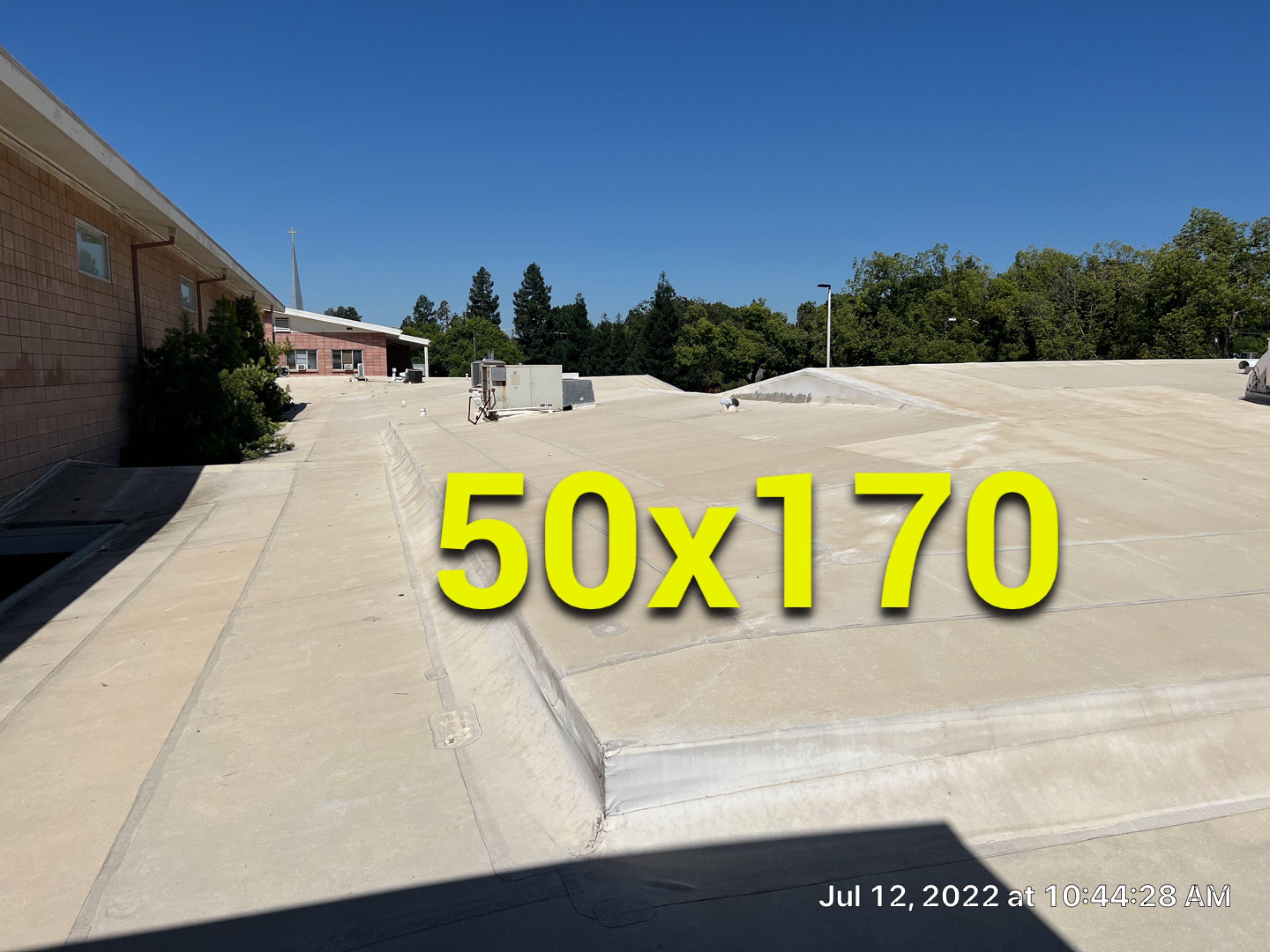 MR Roofing system using Benchmark/PUMA XL coatings over TPO single-ply roofing by Straight Edge Roofing Inc