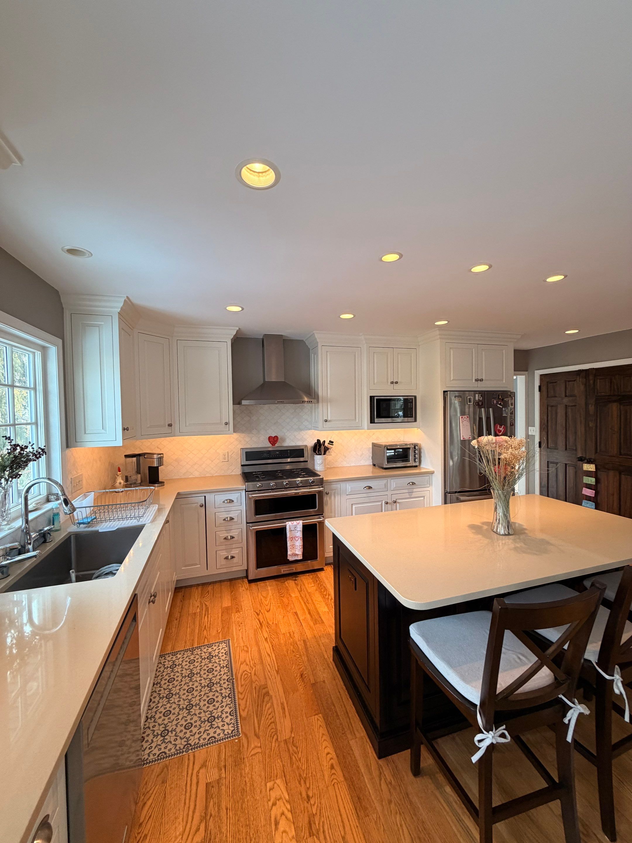 A Smooth, Factory Finish Kitchen Cabinet Transformation by Groovy Hues