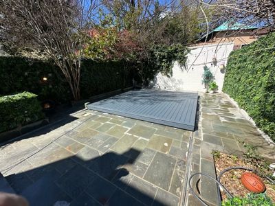 Automatic deking pool cover