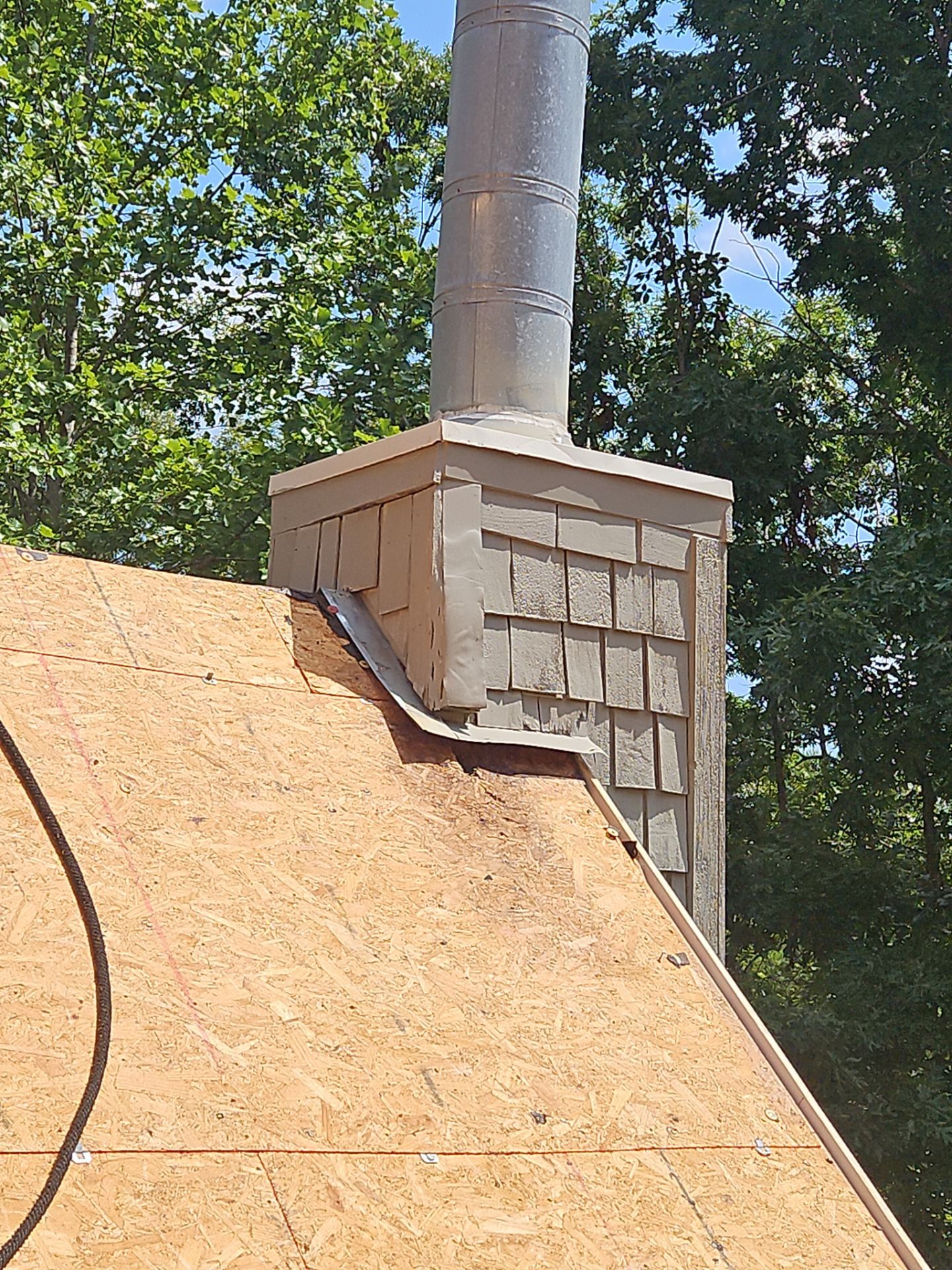 Shingle Replacement in Sterrett (Weathered Wood) by The Roofing Dudes