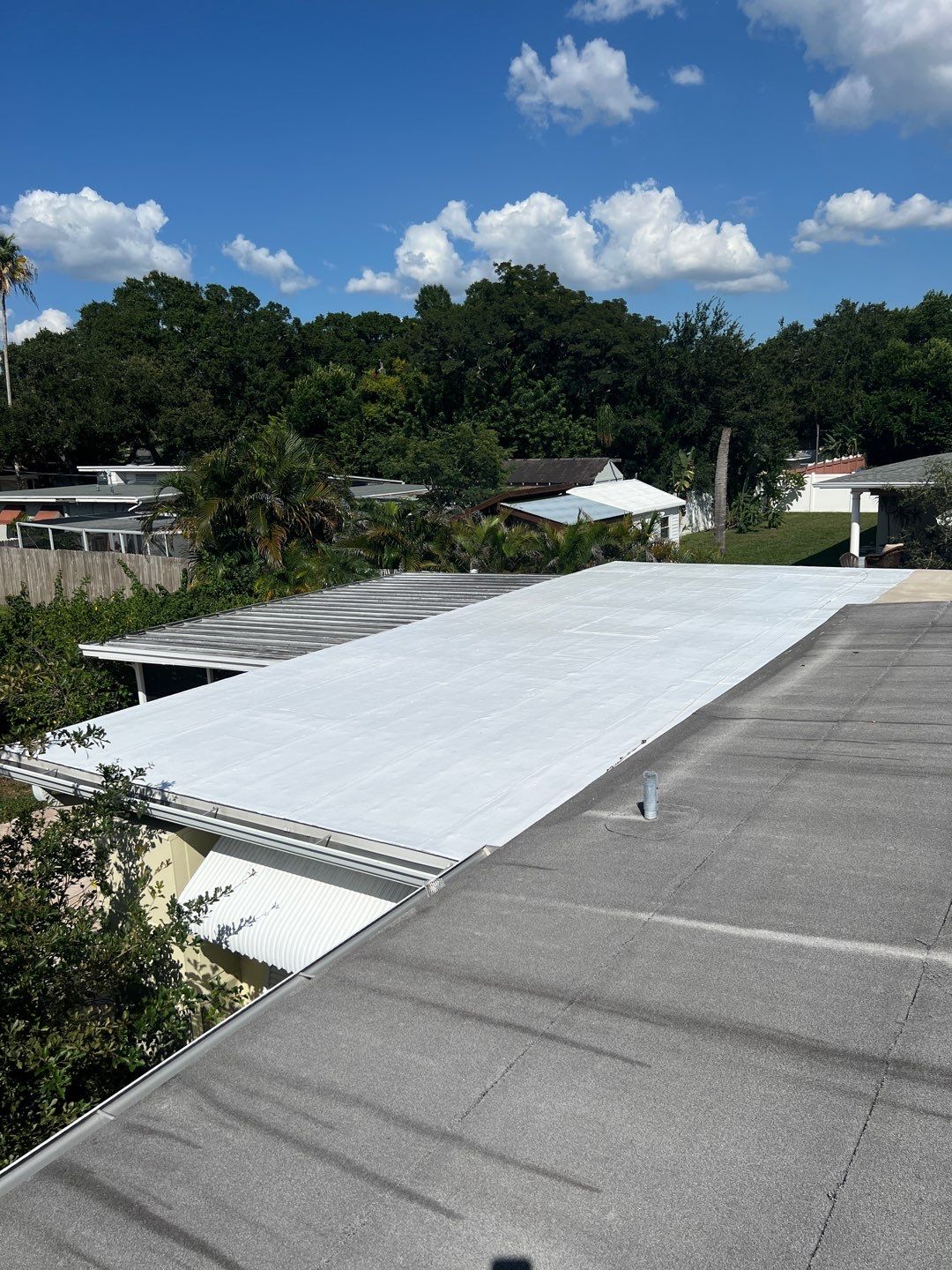 Low Sloped Roof Coating by RoofSmith of Tampa Bay