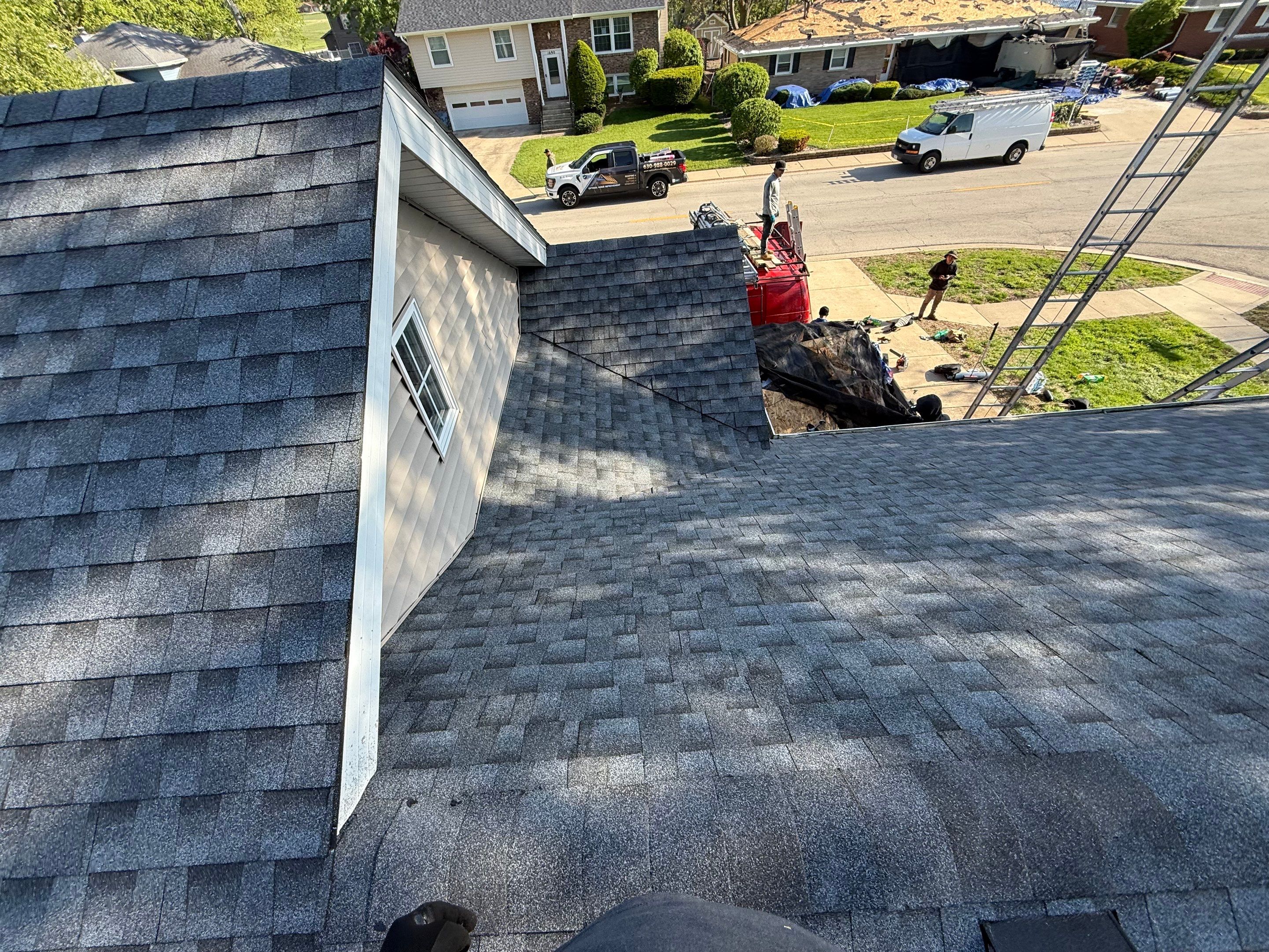 Roof replacement by Optimal Home Improvement 