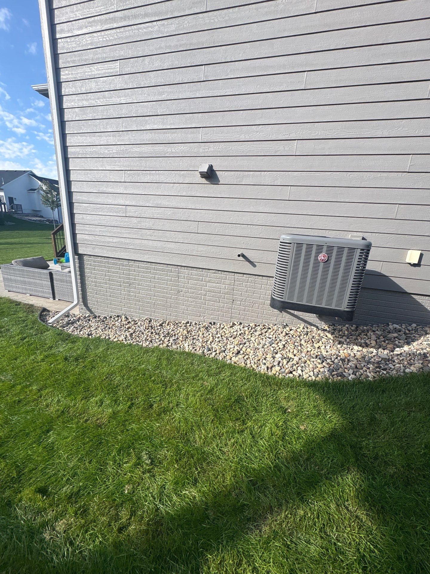 Gray Foundation Painting and Exterior Surface Refresh in Sioux Falls by Select Painting, Coatings & Garage Cabinets