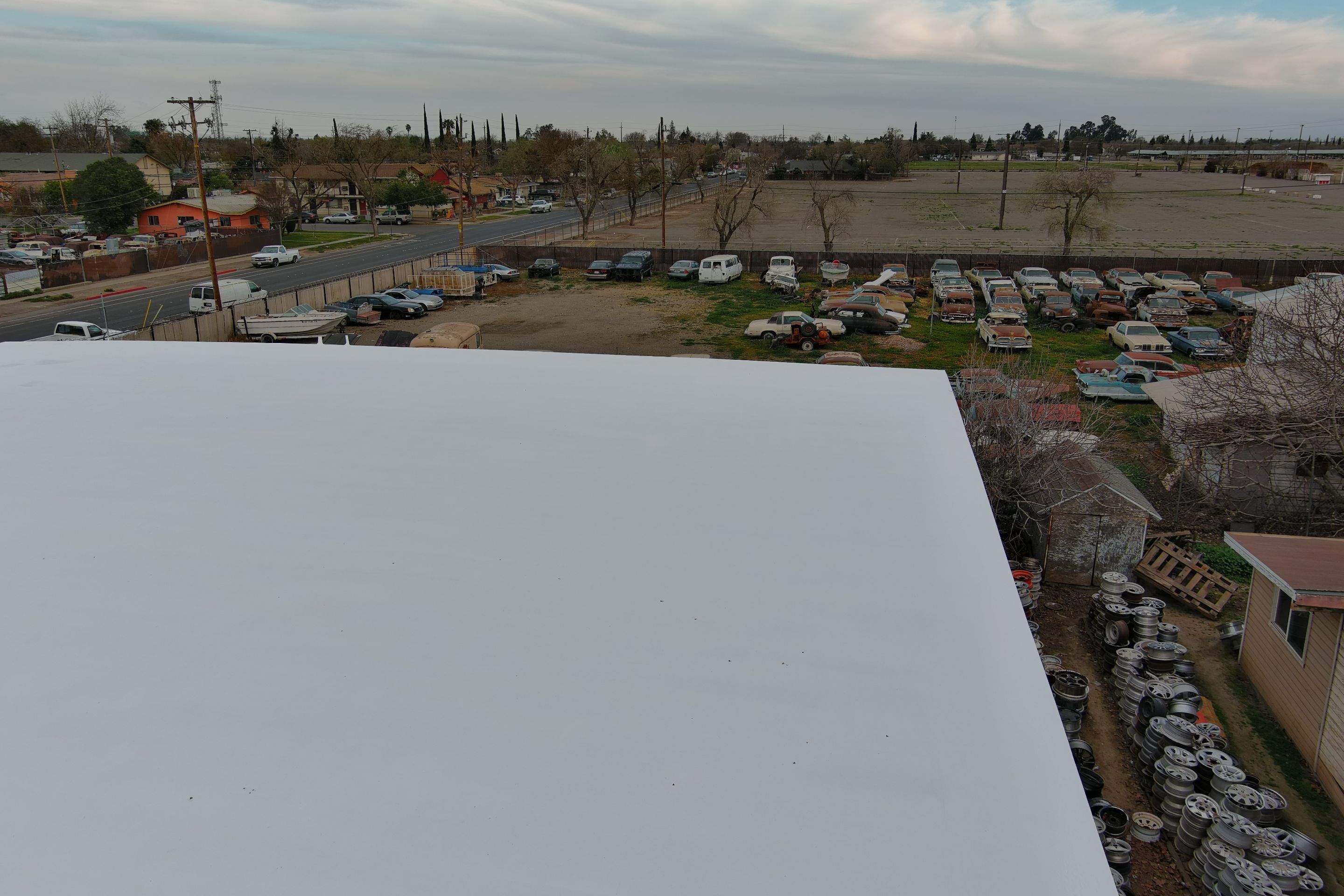 Spray foam and coatings using Conklin Benchmark/PUMA XL coatings and spray foam by Straight Edge Roofing Inc