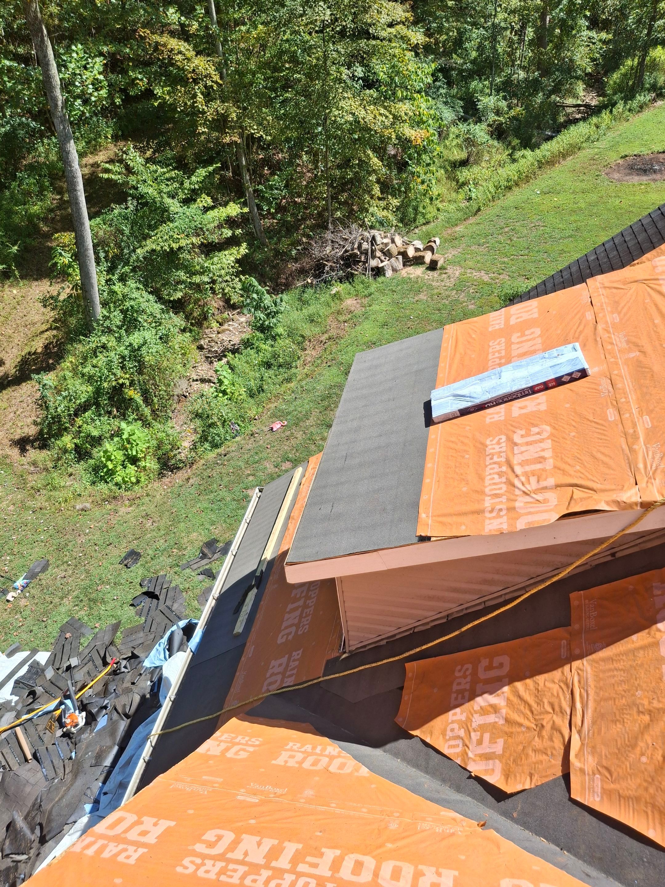 Residential Roofing Installation using GAF Timberline HDZ Charcoal by Rainstoppers Roofing