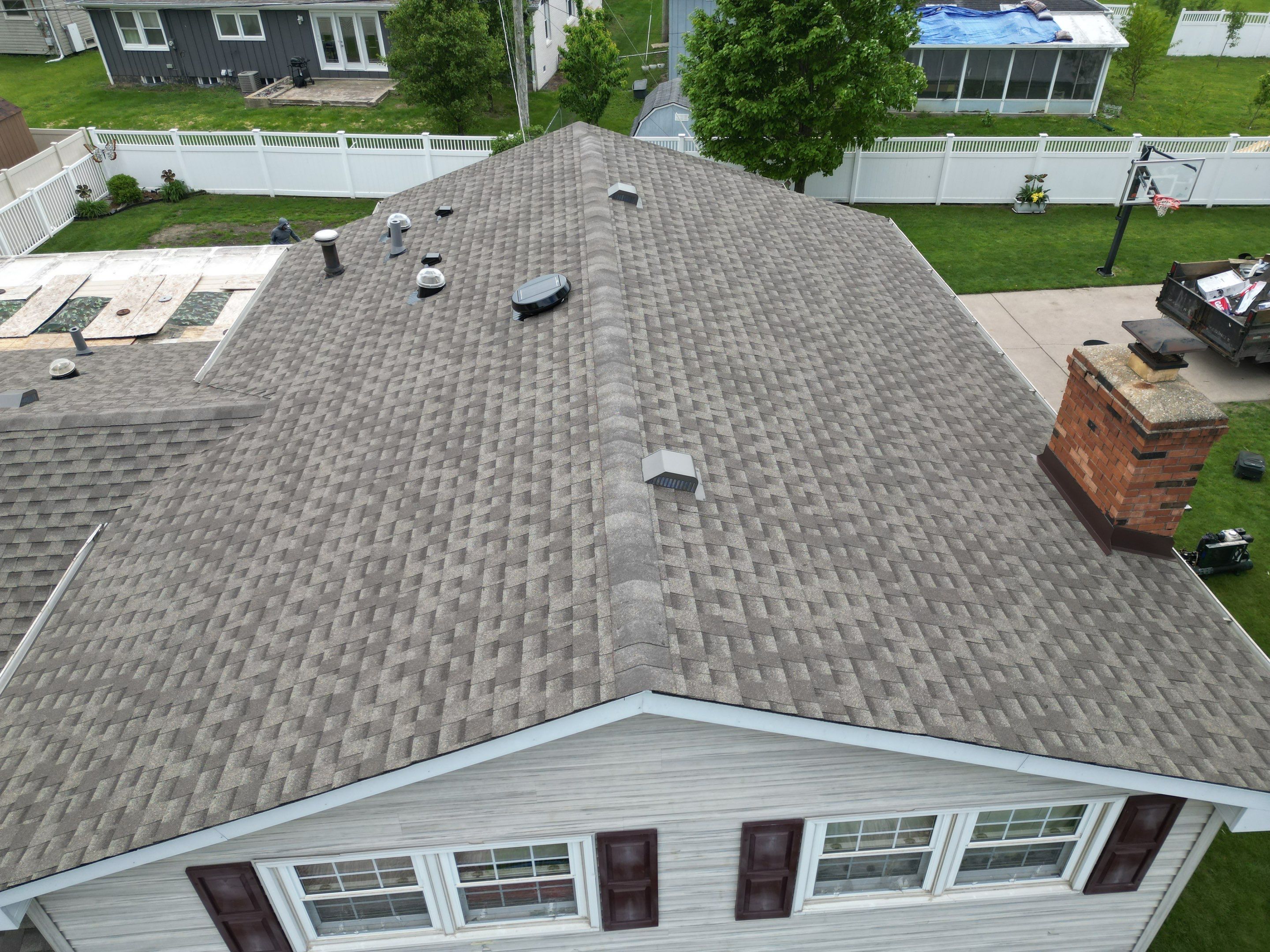 Roof, gutters, windows & siding replacement by Optimal Home Improvement 