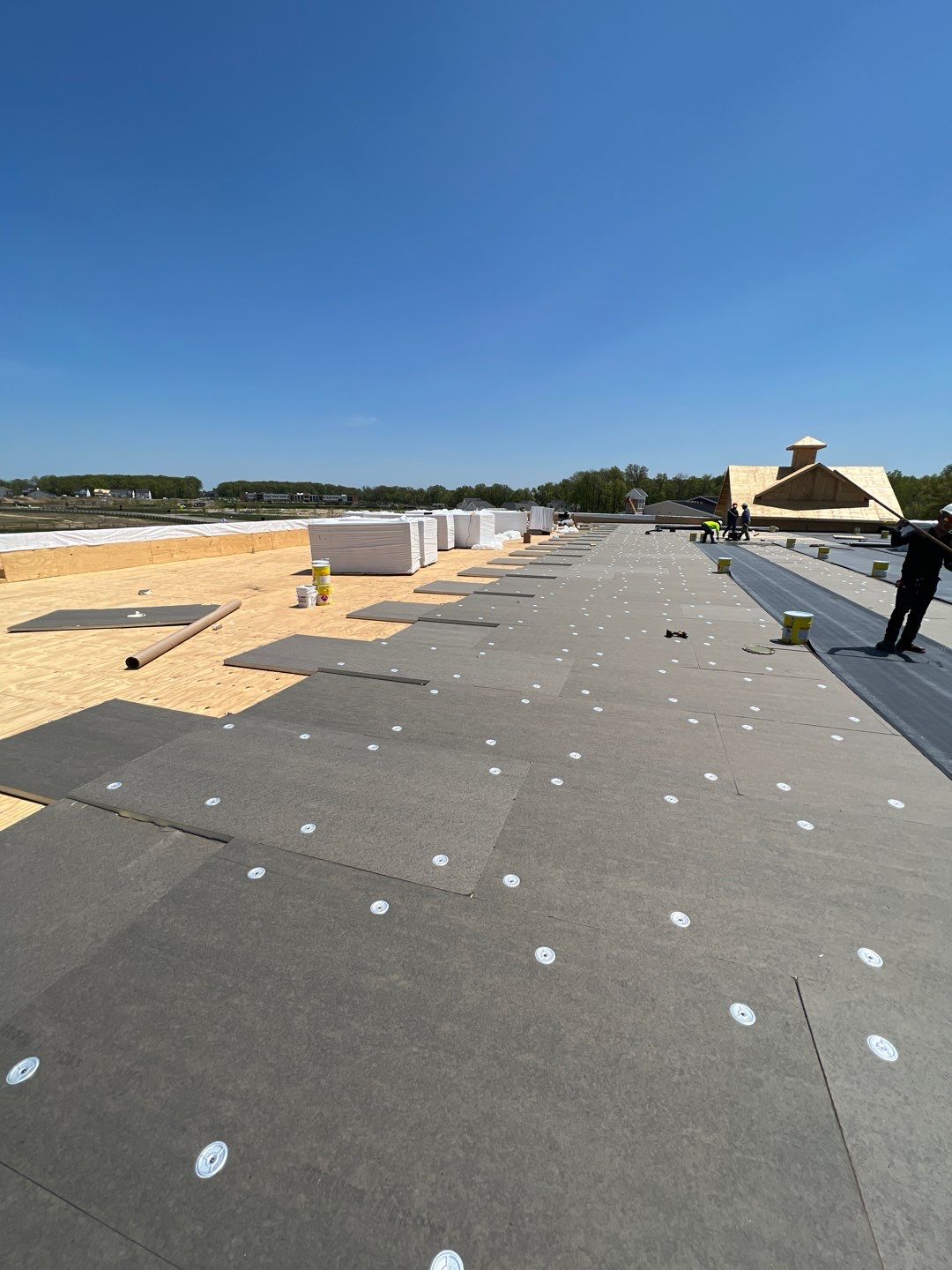 Commercial Roofing Installation using 60 mil rubber roof  by Nitro Roofing and Construction
