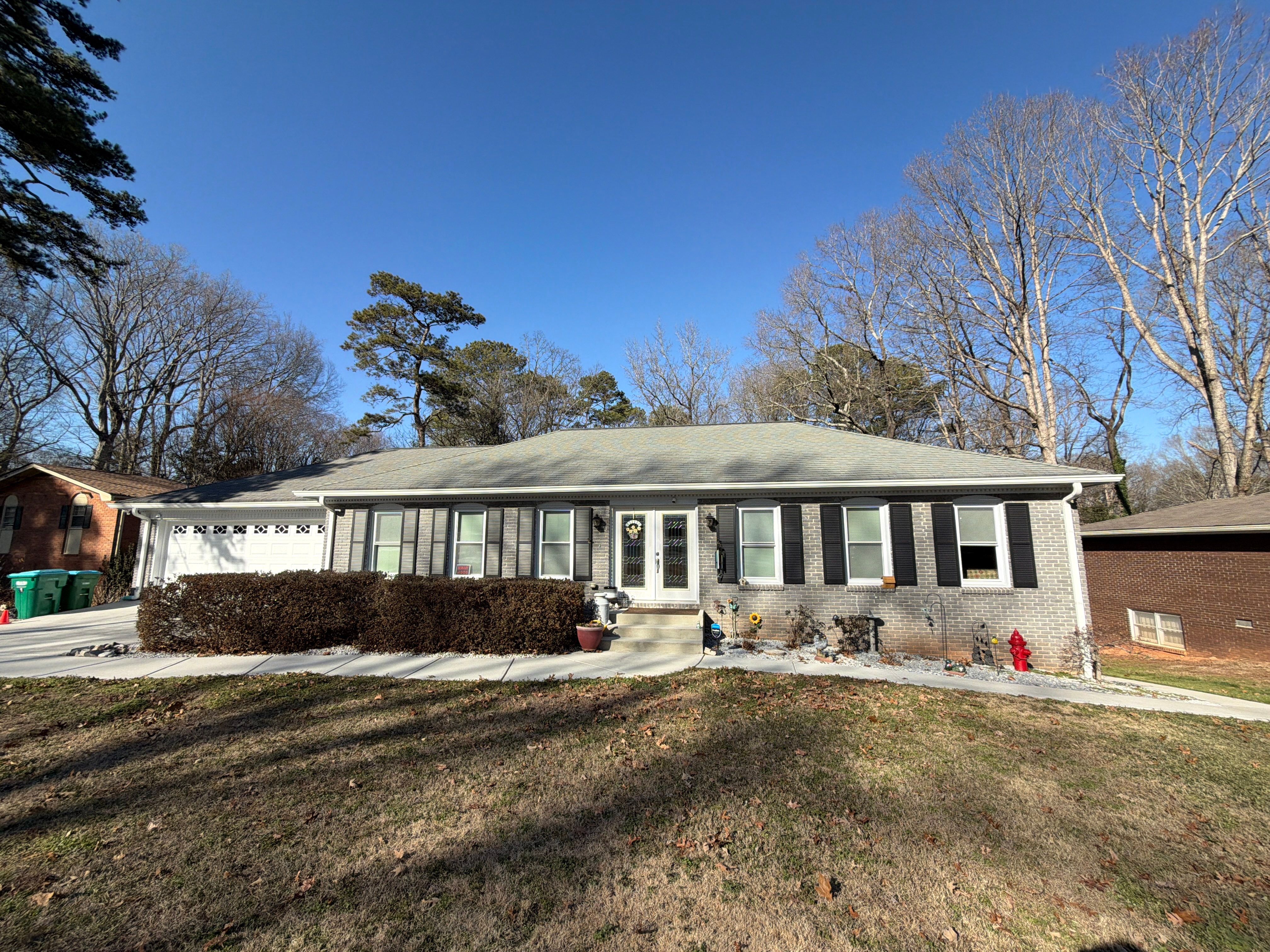 James Hardie Siding Replacement, Trex Railing Install, Exterior Painting, and Staining in Stone Mountain, GA by Nelson Exteriors 