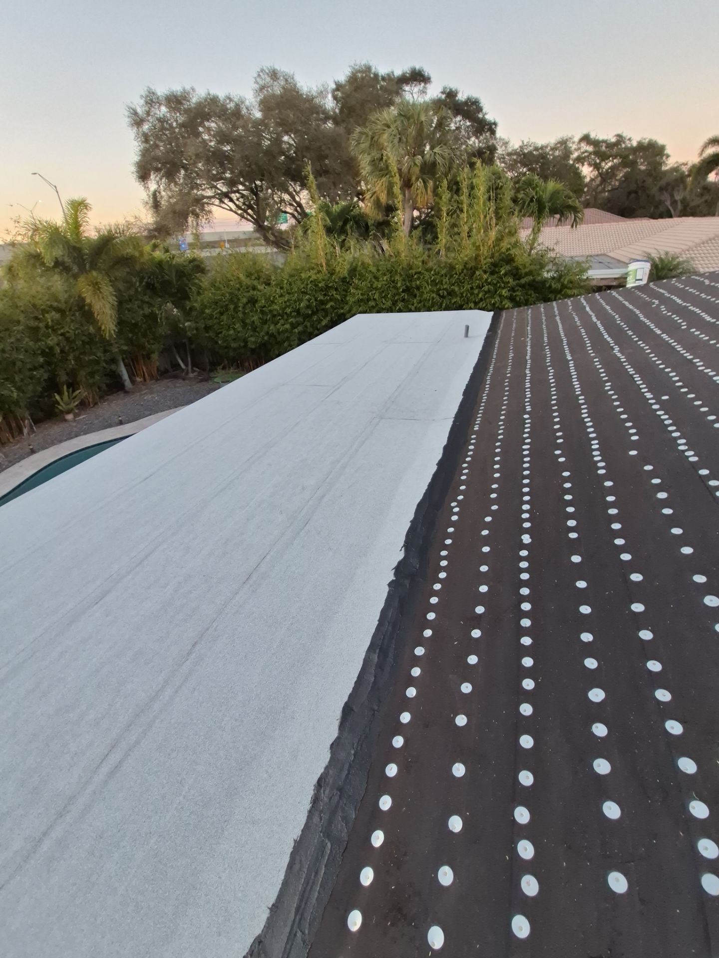 Residential Roofing Installation using 1" Nail strip metal roof by BLUES BROTHERS CONSTRUCTION CORP