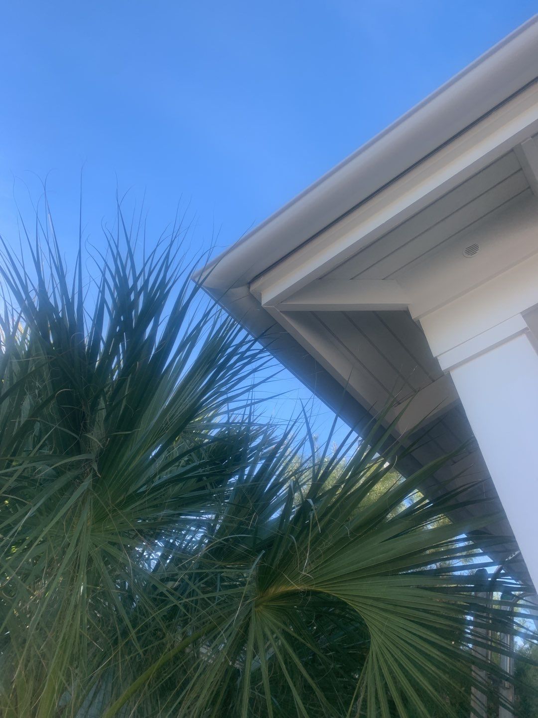 White Half-Round Gutters Installation in Rosemary Beach, FL by Gutter Professors