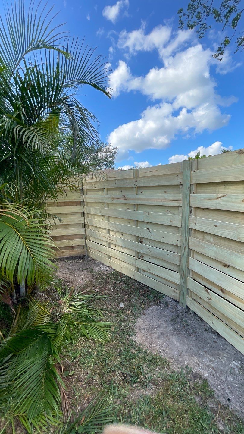 Wood Fence Installation using Shadowbox Wood Fence by Asap fence and gates, LLC