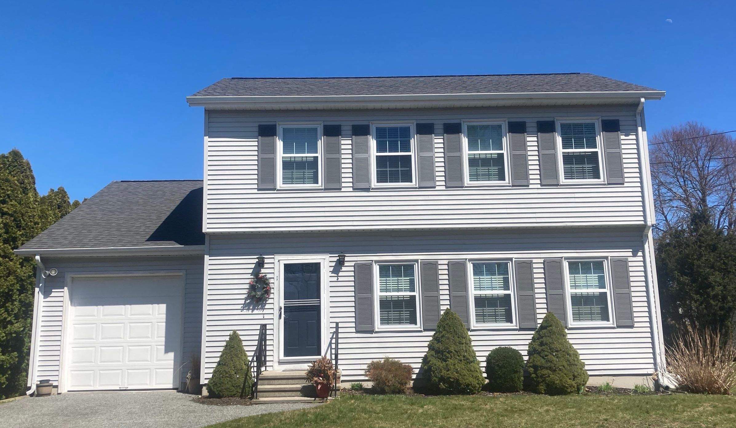 Pewterwood Roofs by Pinnacle Roofing & Skylights