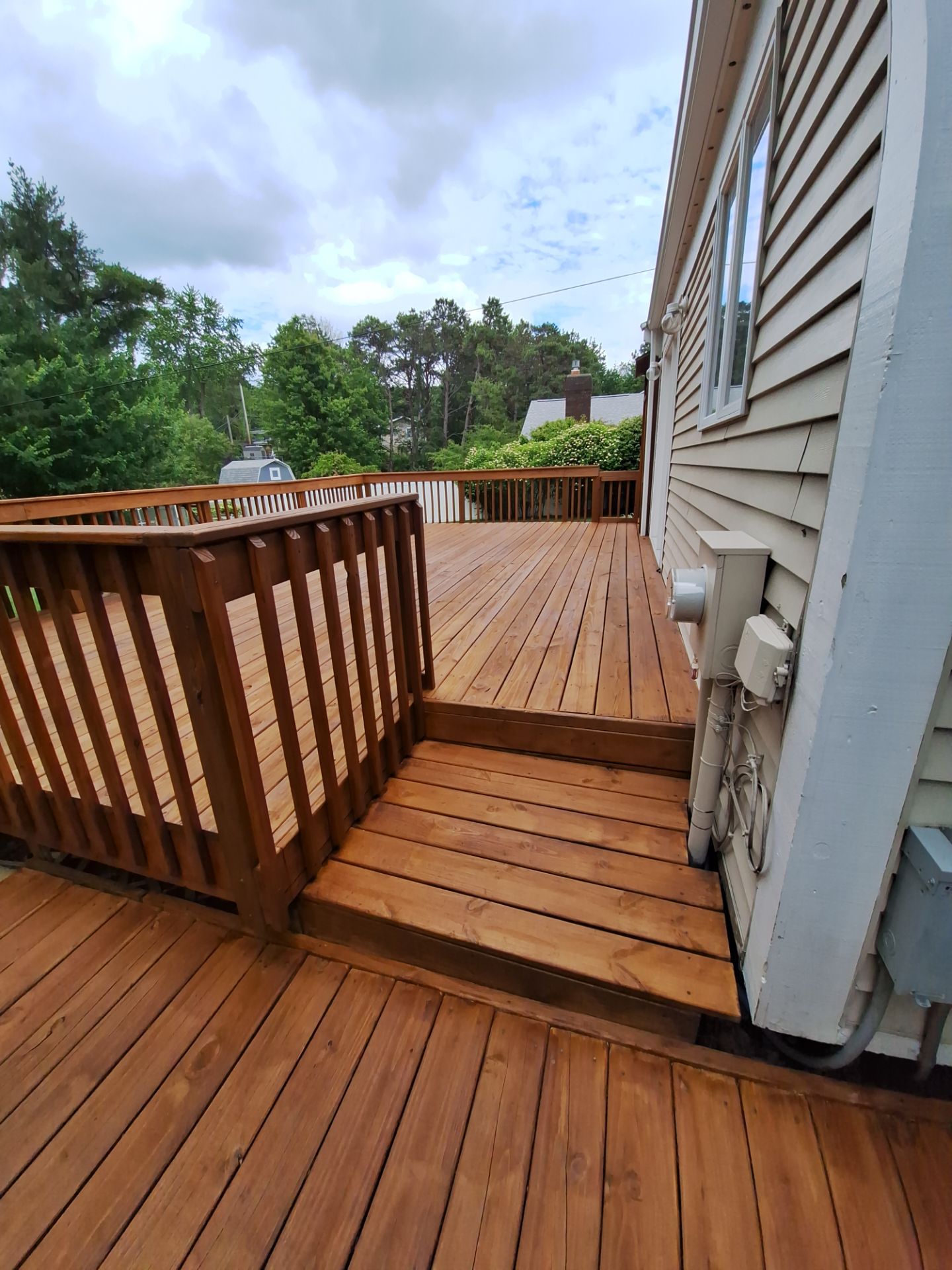 Deck Wash & Stain Transformation | Spring Lake, Michigan by Gordon Painting