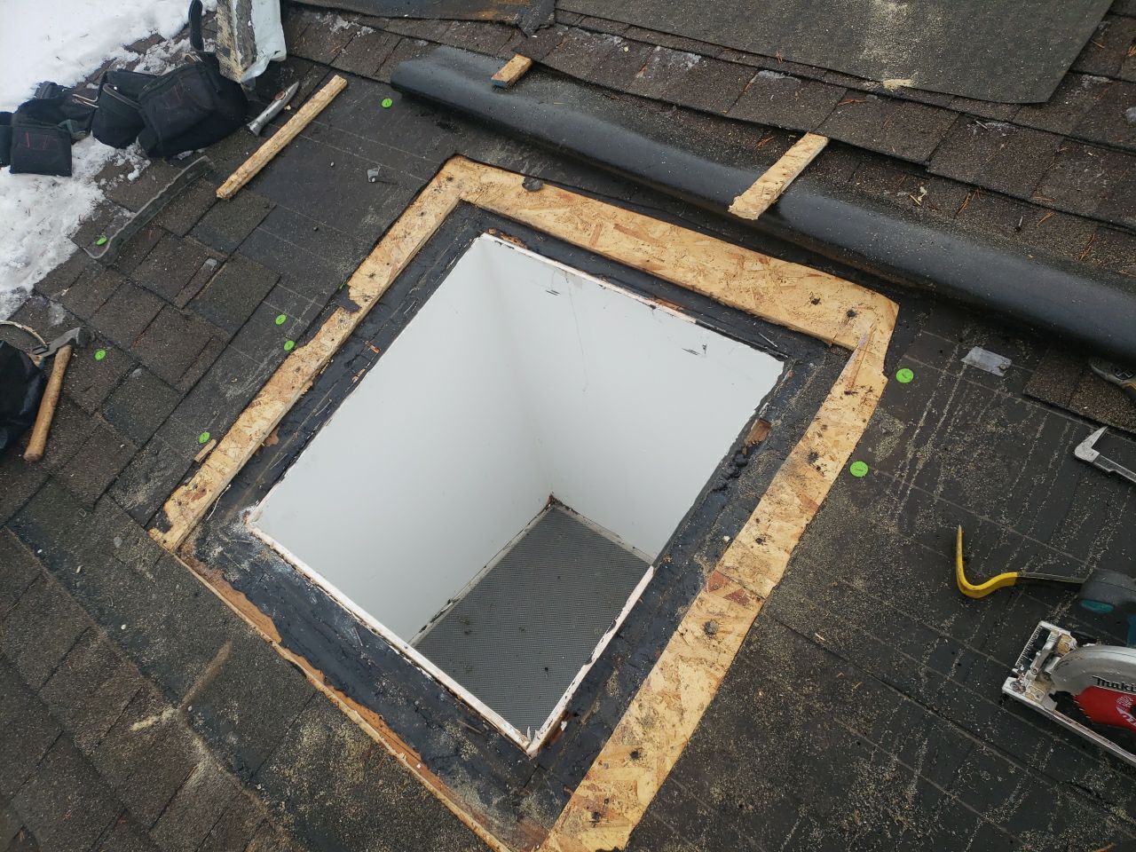 Skylight Removal using Shingle Repair by The Roof Doctor