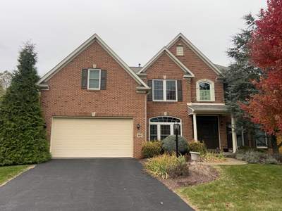 Partial Siding Renovation with Tan Vinyl Siding in Canonsburg