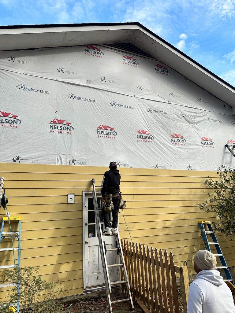 Atlanta, GA James Hardie Siding, Pressure Treated Wood Deck Replacement, and Exterior Painting by Nelson Exteriors 