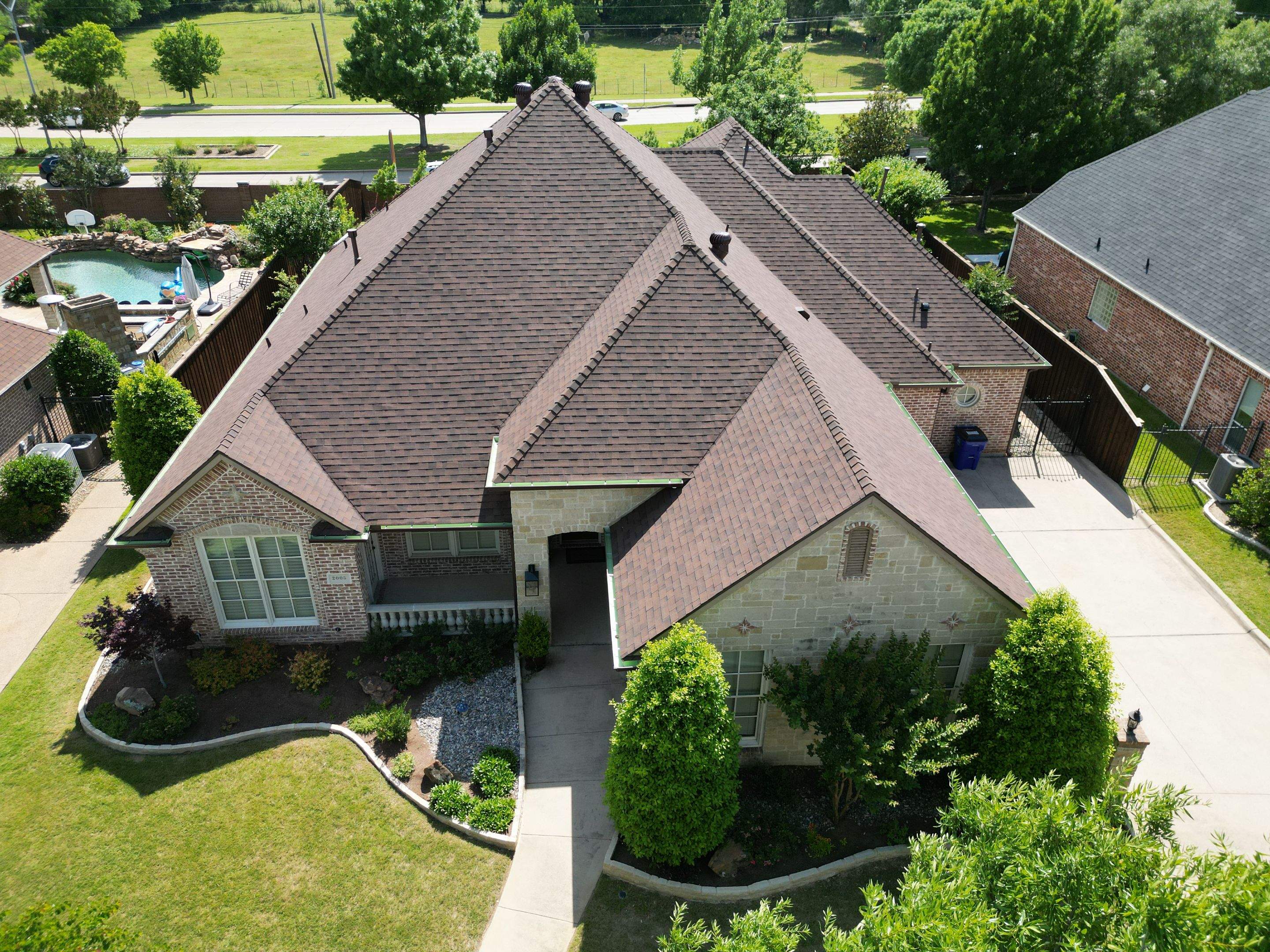 Residential Roofing Installation using Malarkey Legacy Scotchgard Shingles by Harvey Roofing & Construction