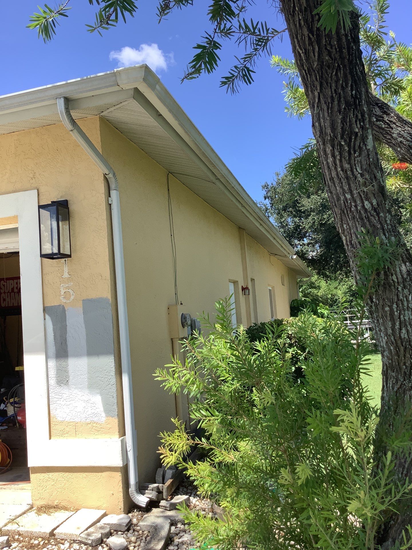 White Seamless Gutters Installation in North Fort Myers FL by Gutter Professors