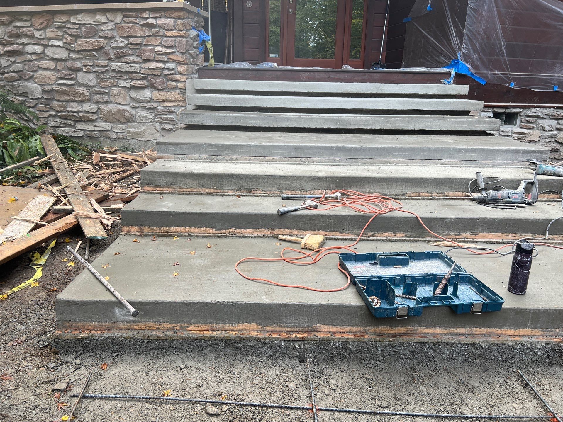 Pia | Custom Concrete Driveway, Walkway & Floating Steps by Jireh Asphalt & Concrete Inc 