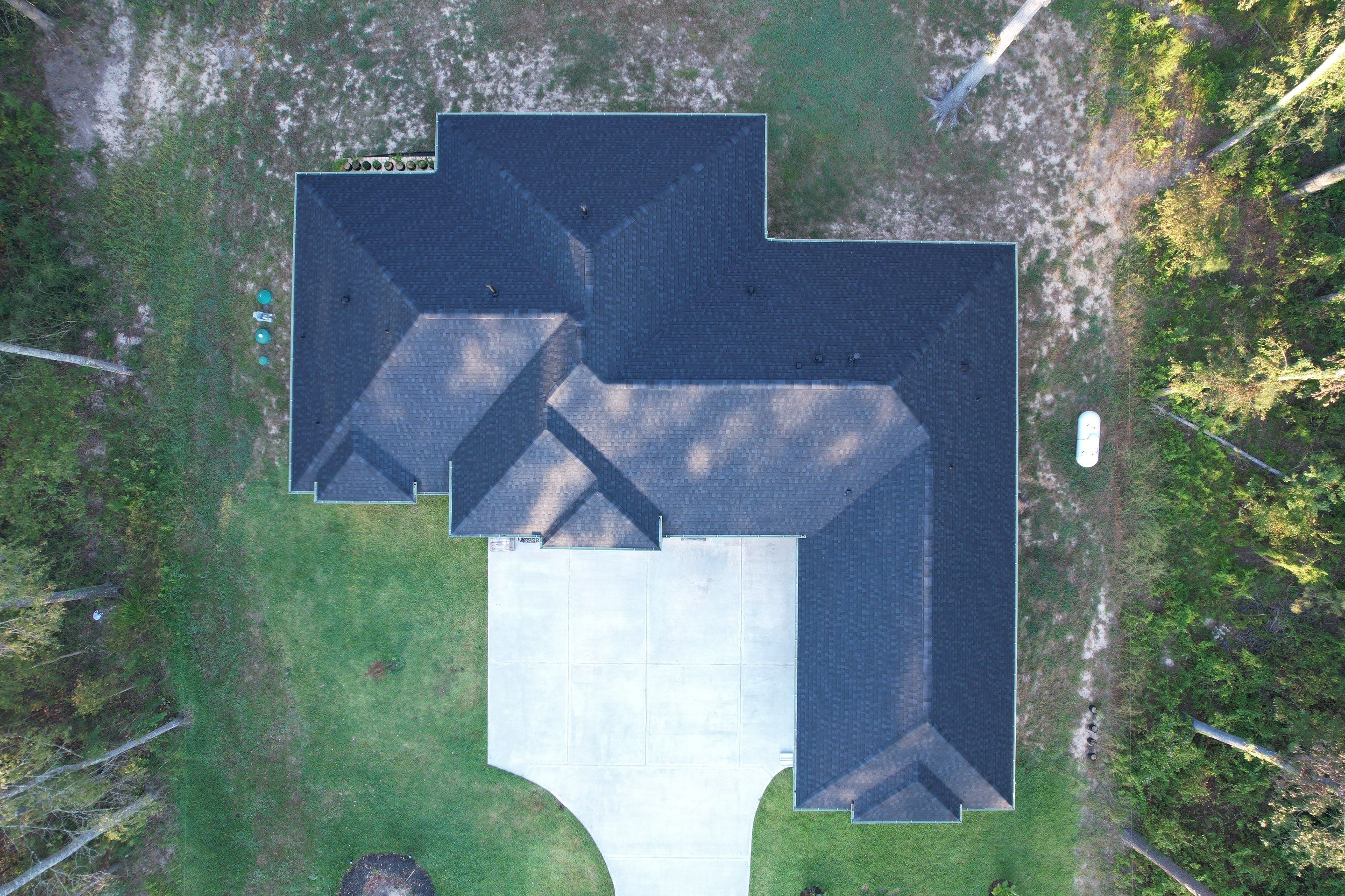 TAMKO Titan XT Rustic Black by STX Roofing