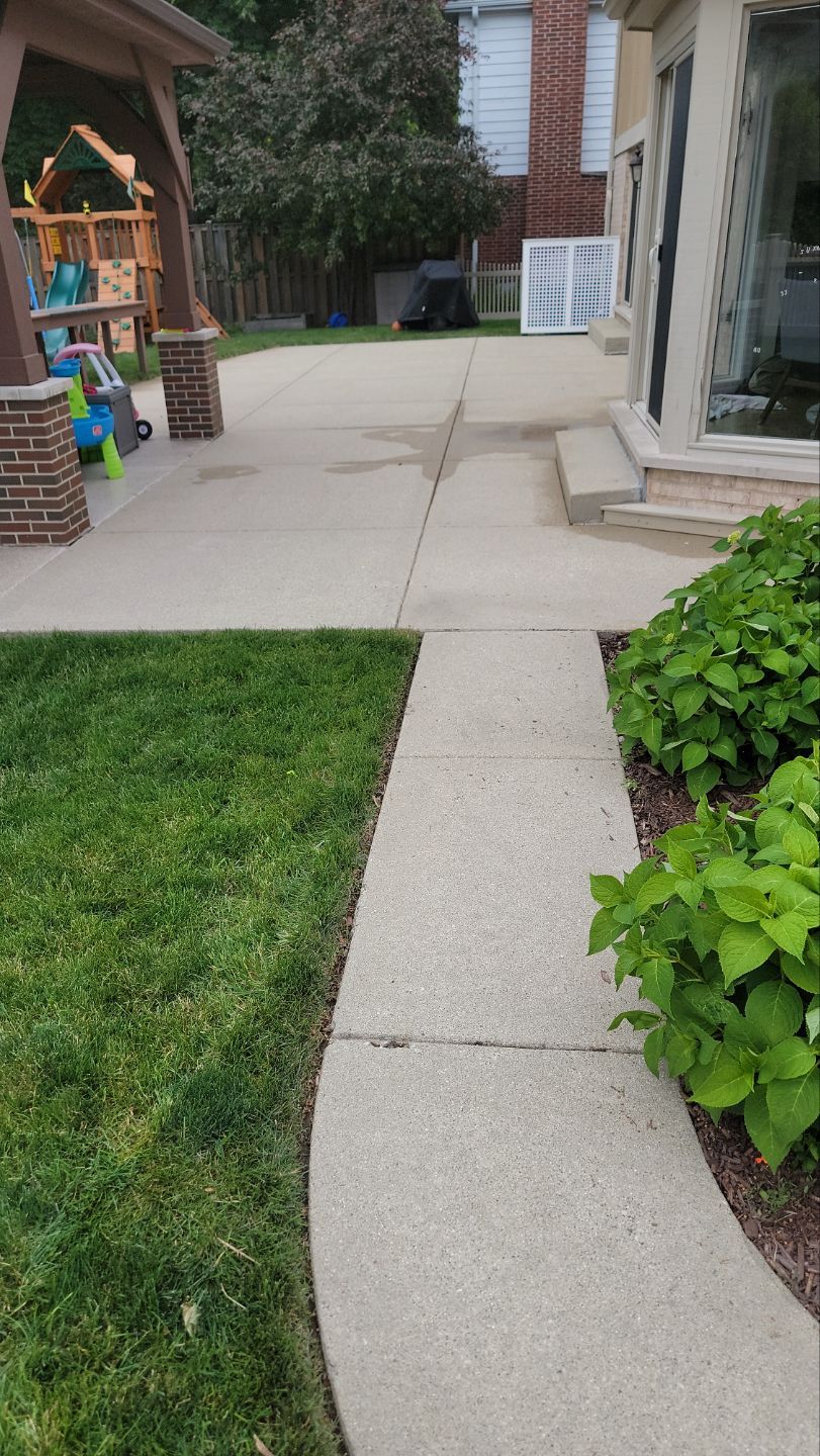 concrete power washing Algaecide, soft wash soap by Northern Power Washing LLC.