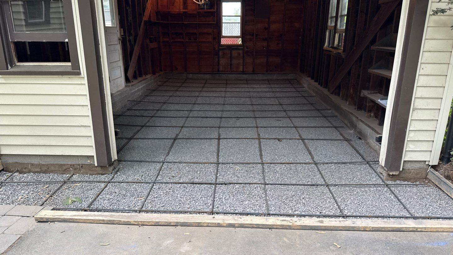 Concrete garage floor replacement  by NG Masonry & Construction LLC