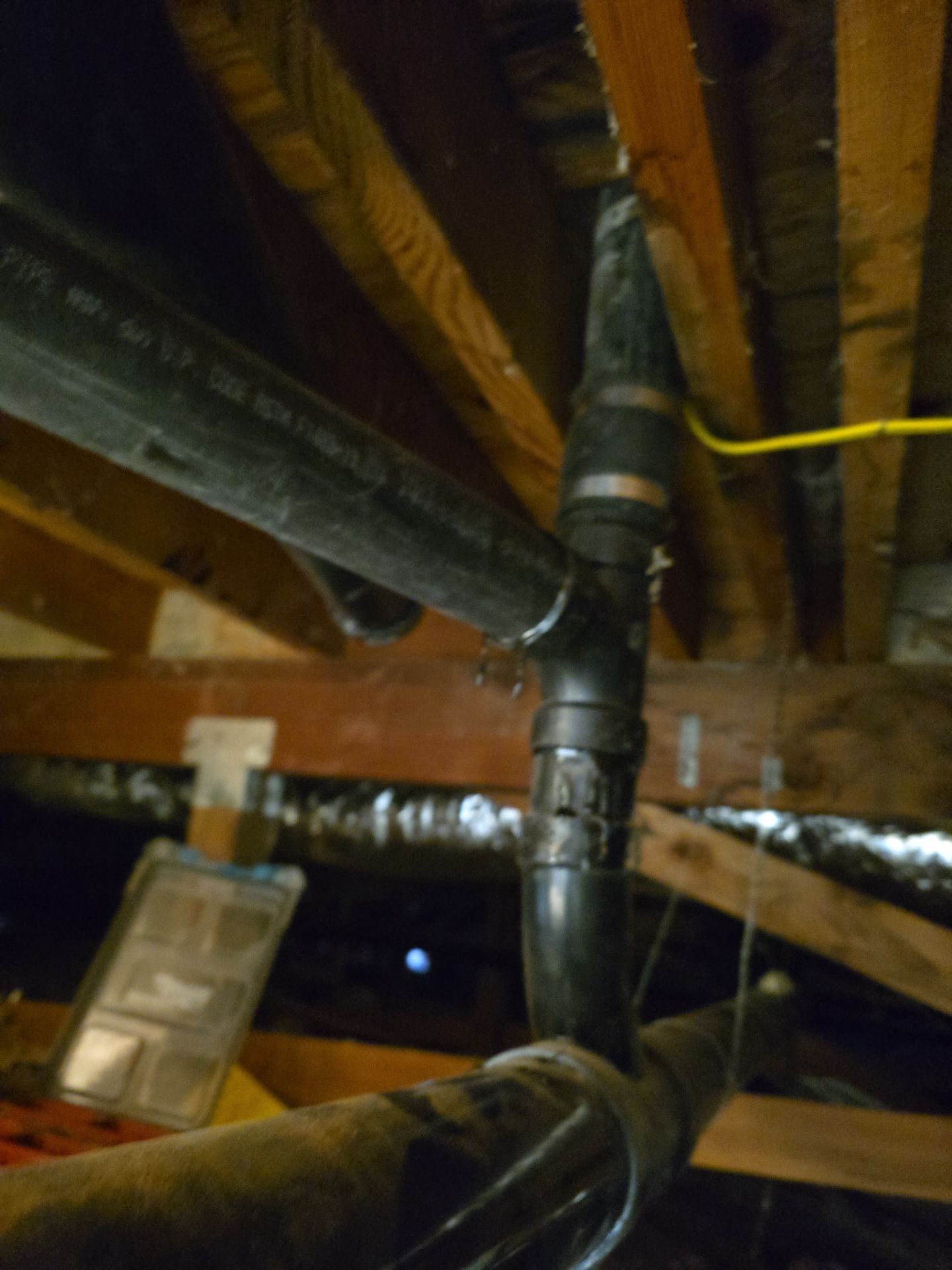 Installation of New Tall Black Piping (Wall to Ceiling) & Underground Piping by Us Plumbing