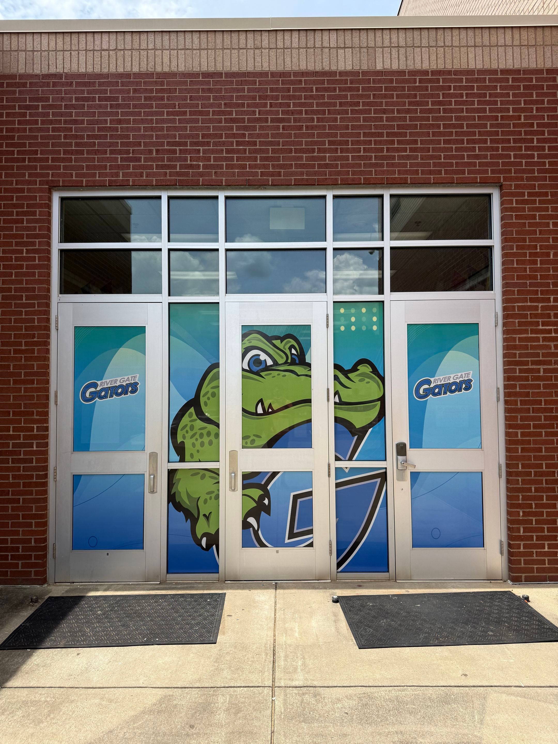 Rivergate Elementary - Window Safety Film Installation with Custom Graphics by QC Signs and Graphics