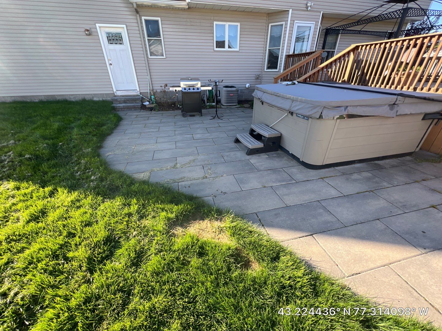 Oxford slate stamped concrete patio  by NG Masonry & Construction LLC