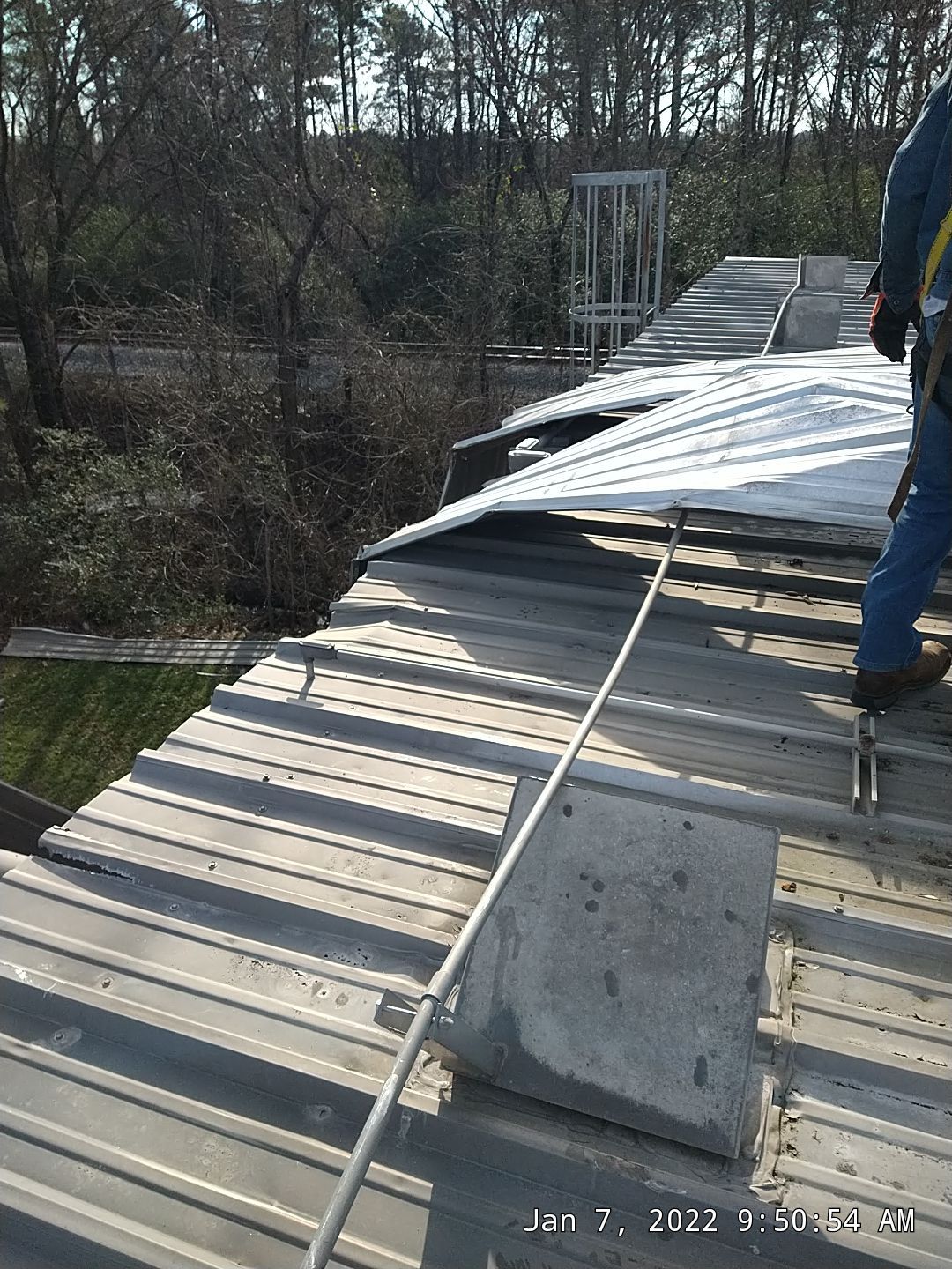 Commercial Roofing Installation using Aluminum Roofing panels by Hostetler Roofing