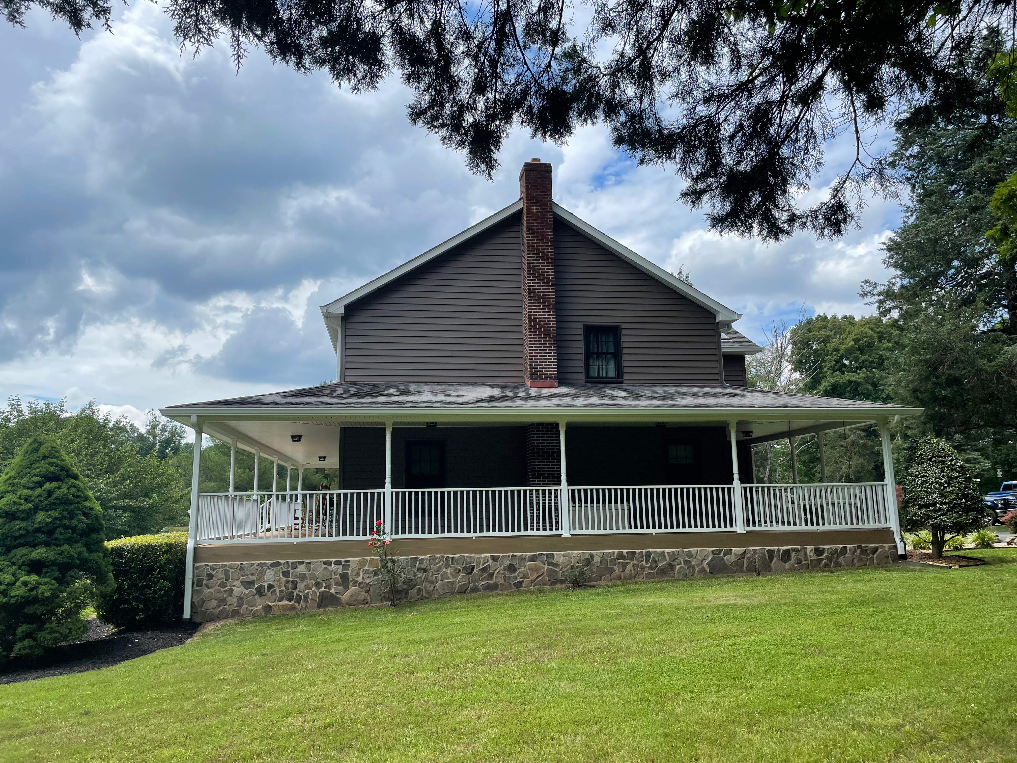 Exterior remodel including window replacement by American Home Contractors