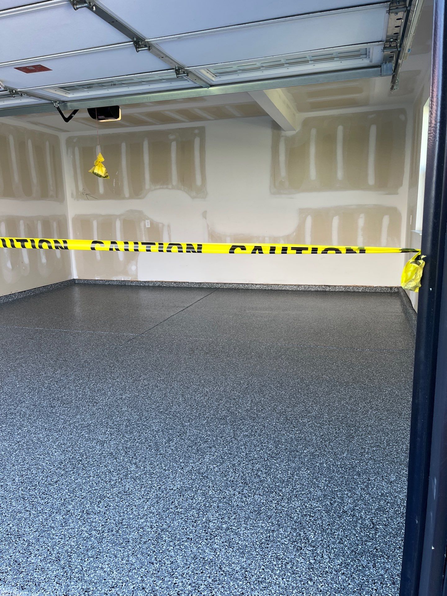 Garage Floor Coating using Wombat by My Garage Floor Guys