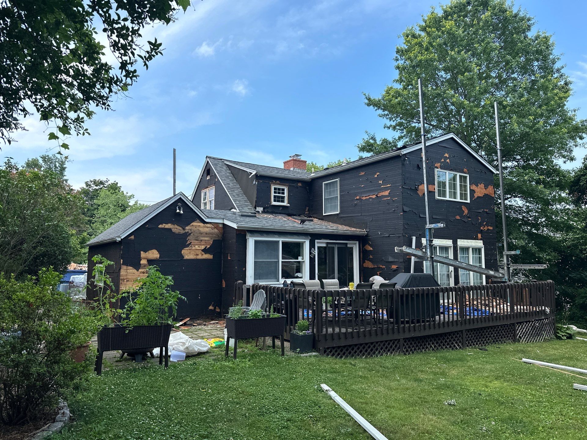 Complete Exterior Estate gray with Pacific Blue Siding by A Plus Exterior