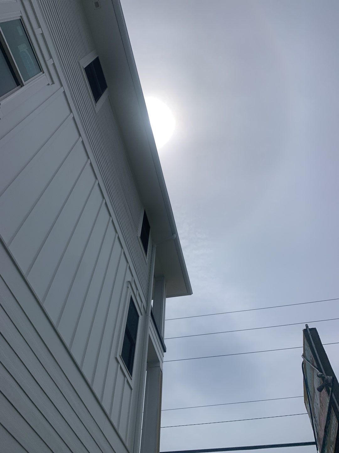 Downspout Installation for Multi-Story Building in Panama City FL by Gutter Professors