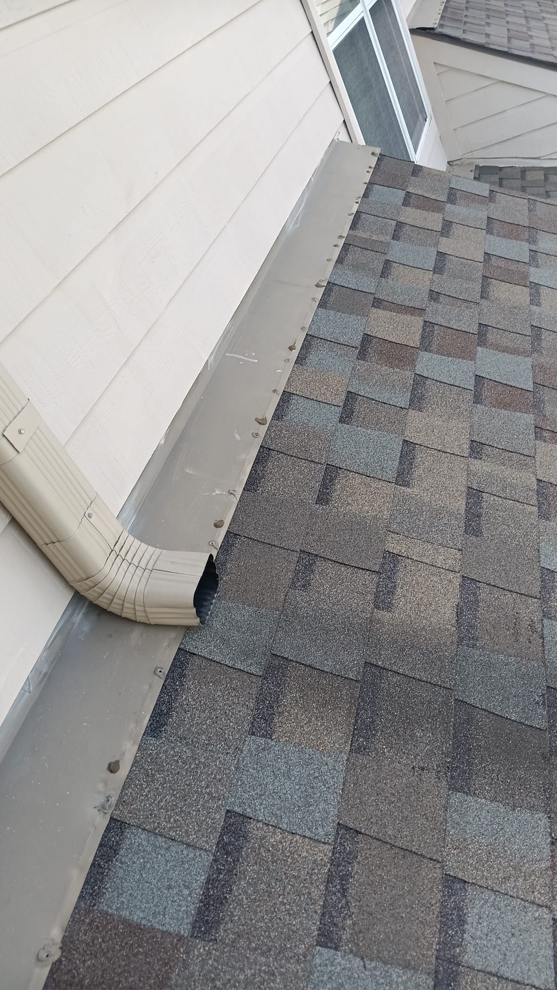Hail Damage using Owen's Corning Duration (Lifetime) Shingles by Roof Repair Company