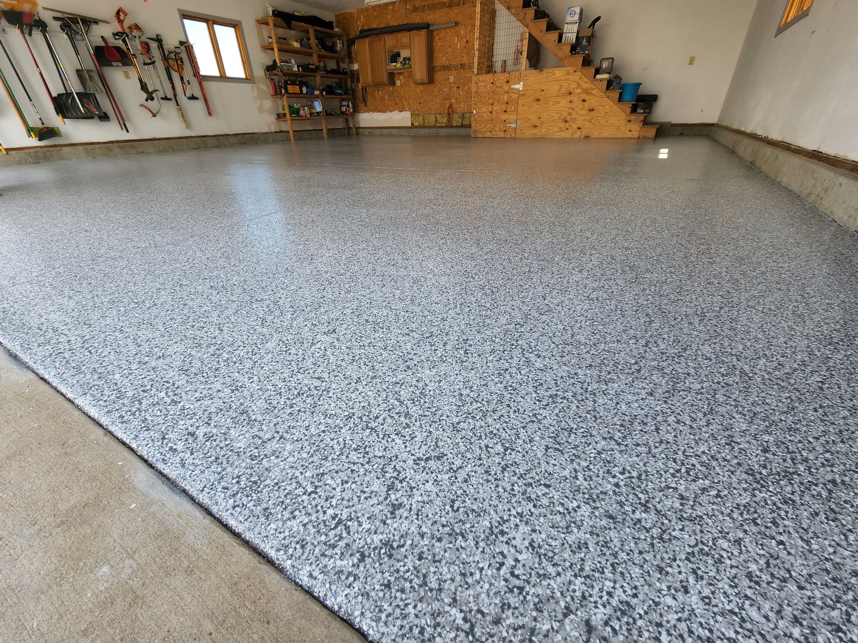 Garage using Slate Stone by Select Painting, Coatings & Garage Cabinets