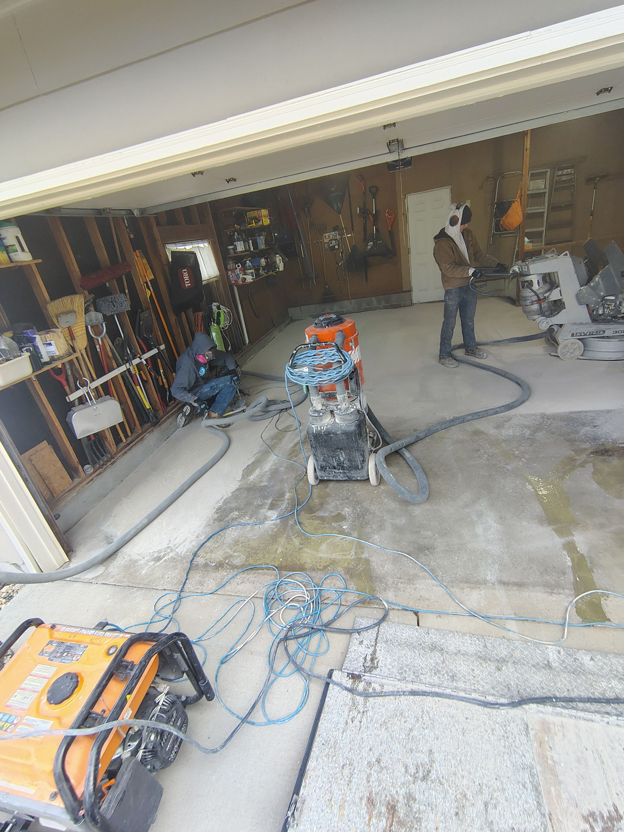 Sioux Falls Garage Epoxy Floor Installation and Concrete Crack Repair by Select Painting, Coatings & Garage Cabinets