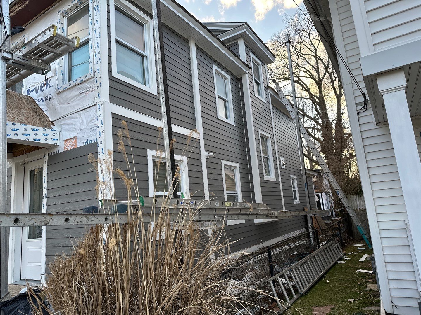 Siding Installation using Hardie Plank Aged Pewter by A Plus Exterior