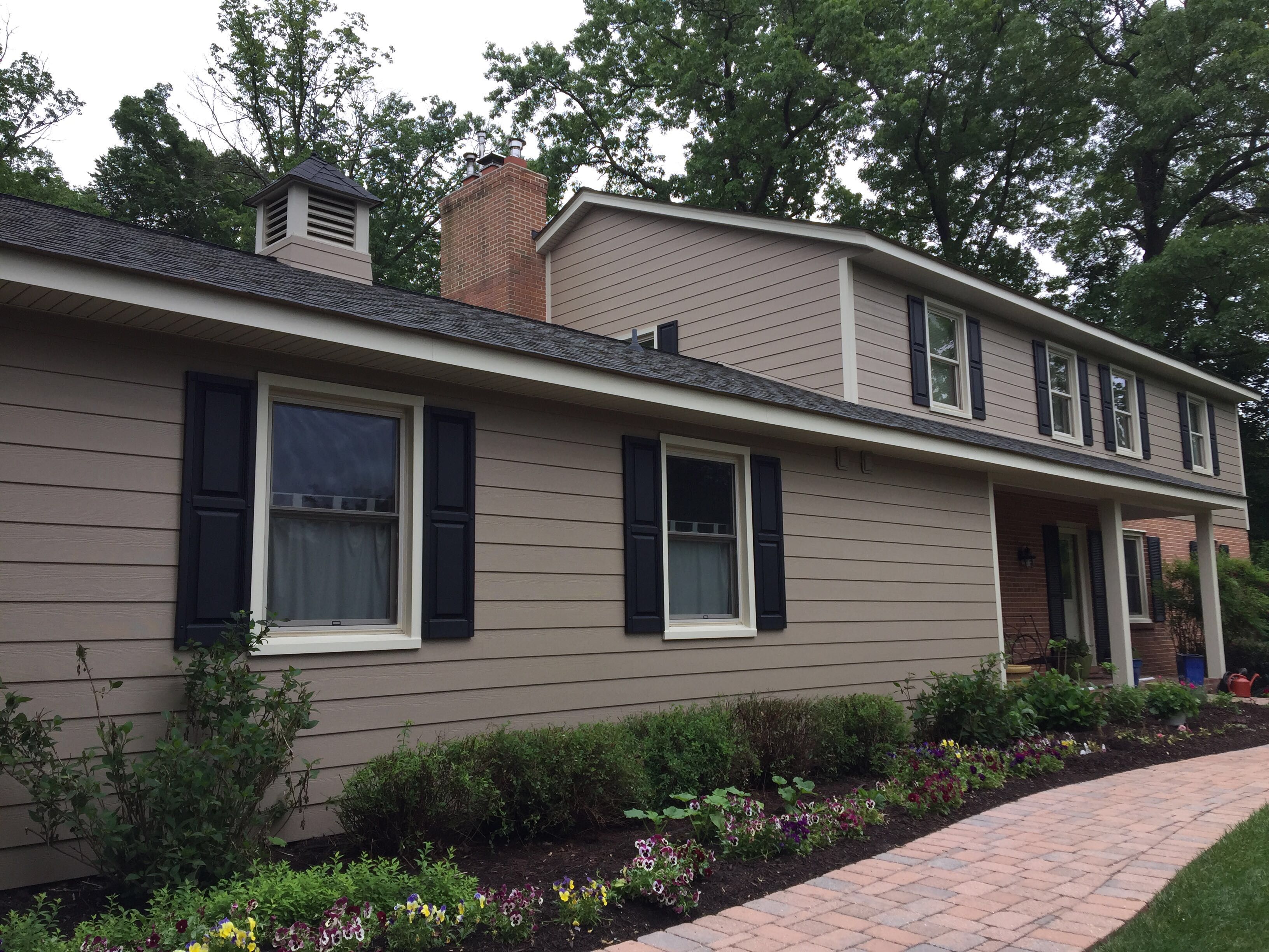 Siding and Roof Replacement by American Home Contractors
