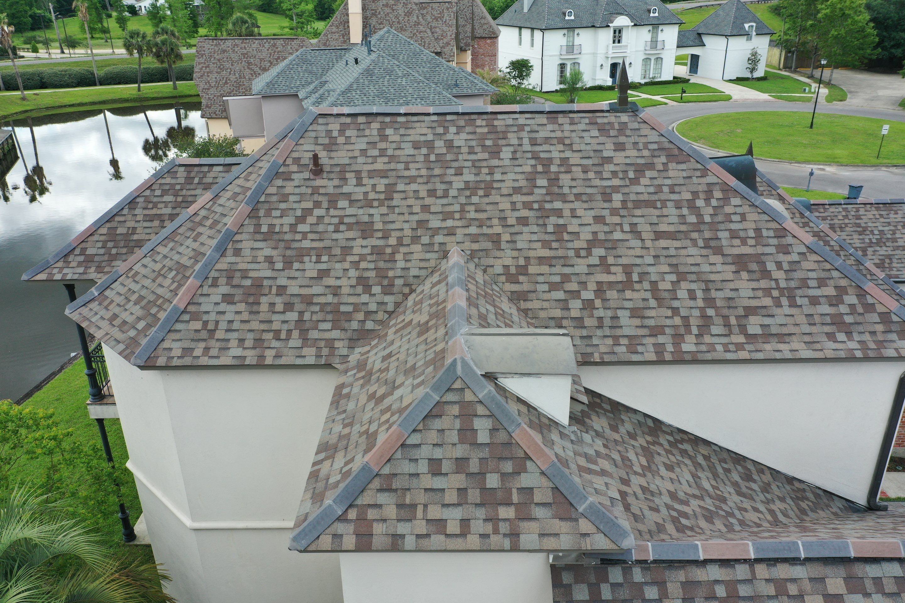 Owens Corning Duration Driftwood with Hecker Ridge Tile by Top Team Construction
