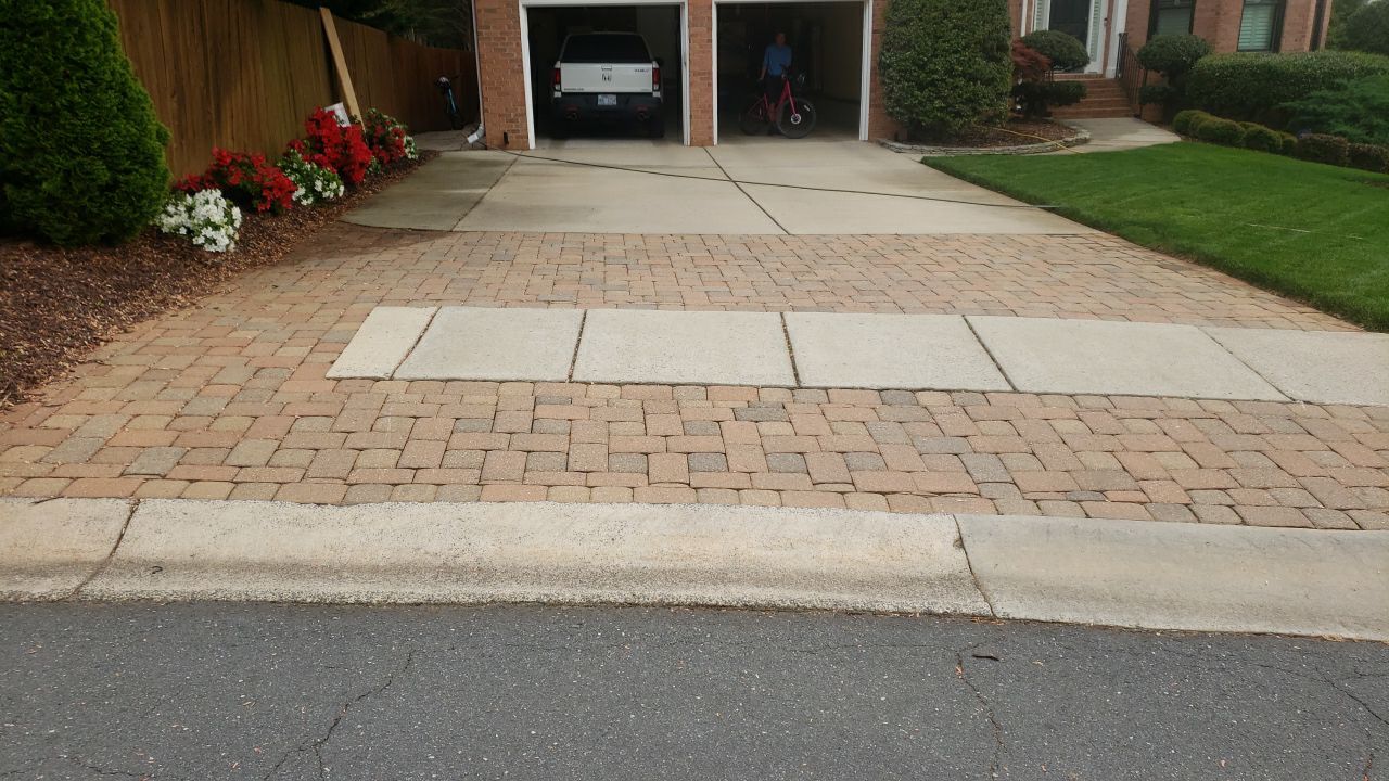 patio cleaning using cleaner by Power Wash Masters LLC