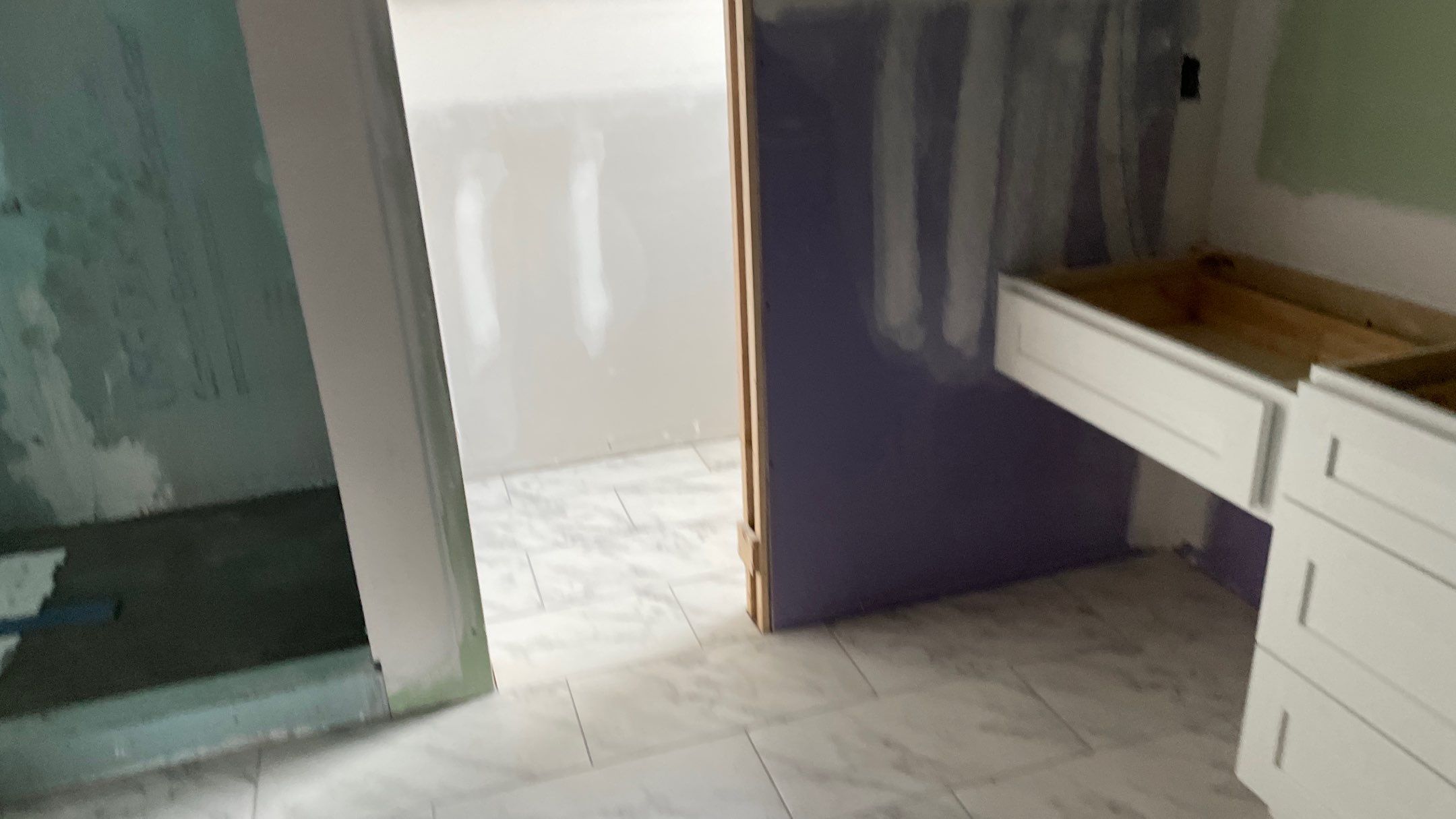 Remodeled Home with new tile floors, Showers and Refinished Oak Floors with stain and Waterbased Finish by Footprints Floors of Coastal Carolina