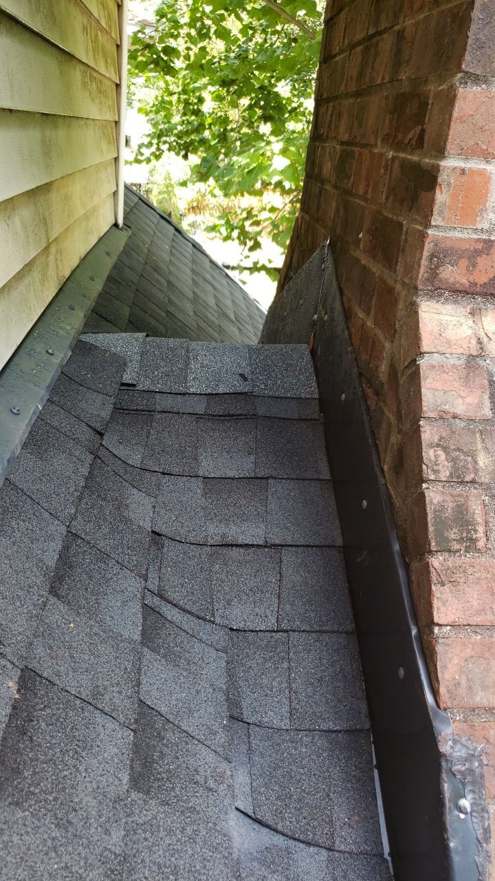 Residential Roofing Installation using Roof Replacement by American Roofing & Construction LLC