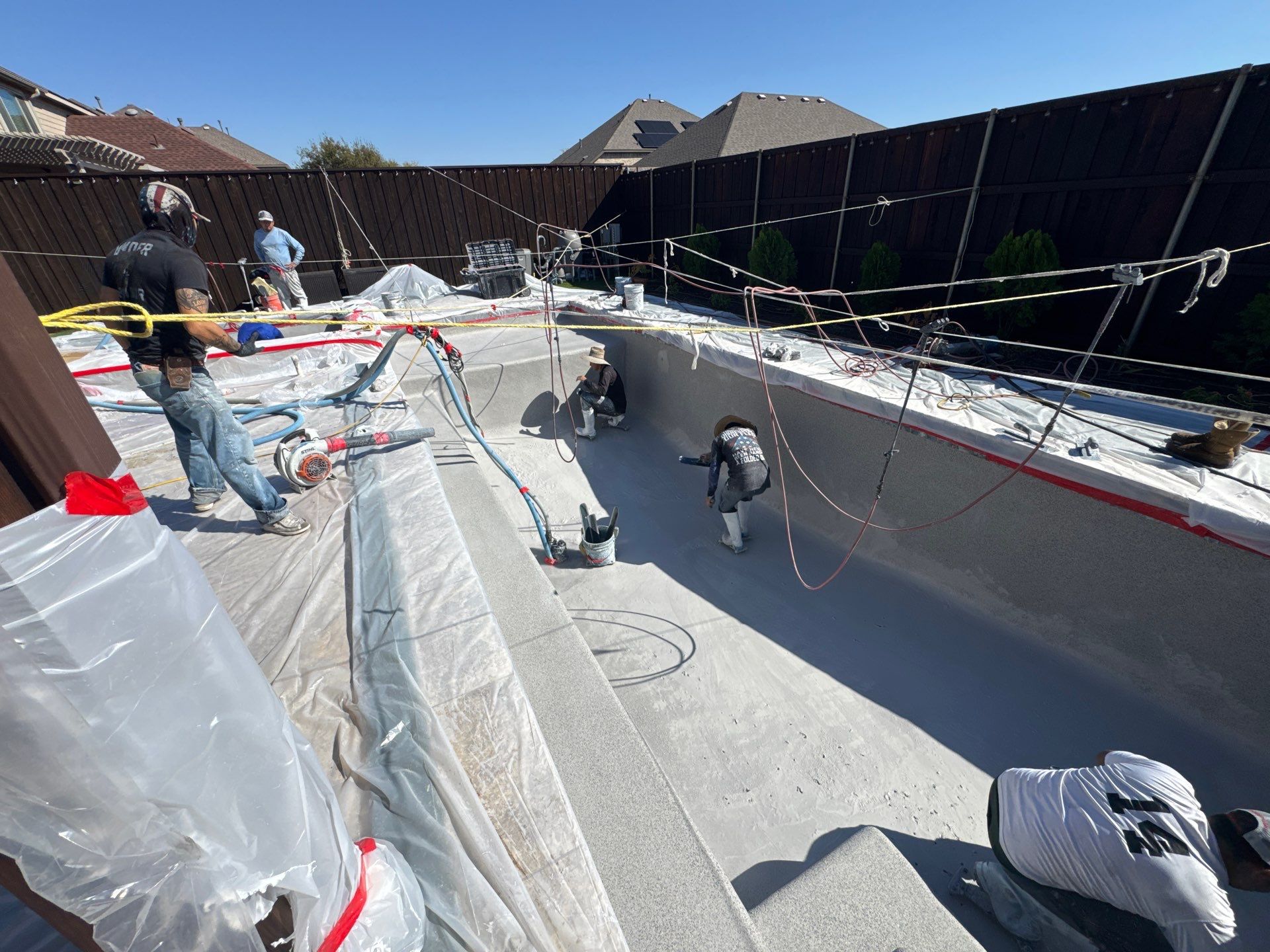 Geometric Pool with Raised Stone Spa by Pinnacle Pools and Spas - DFW