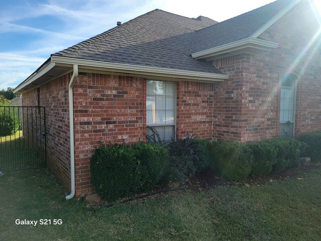 Roof Replacement and Gutter Installment in Edmond, OK by McCann's Roofing and Construction