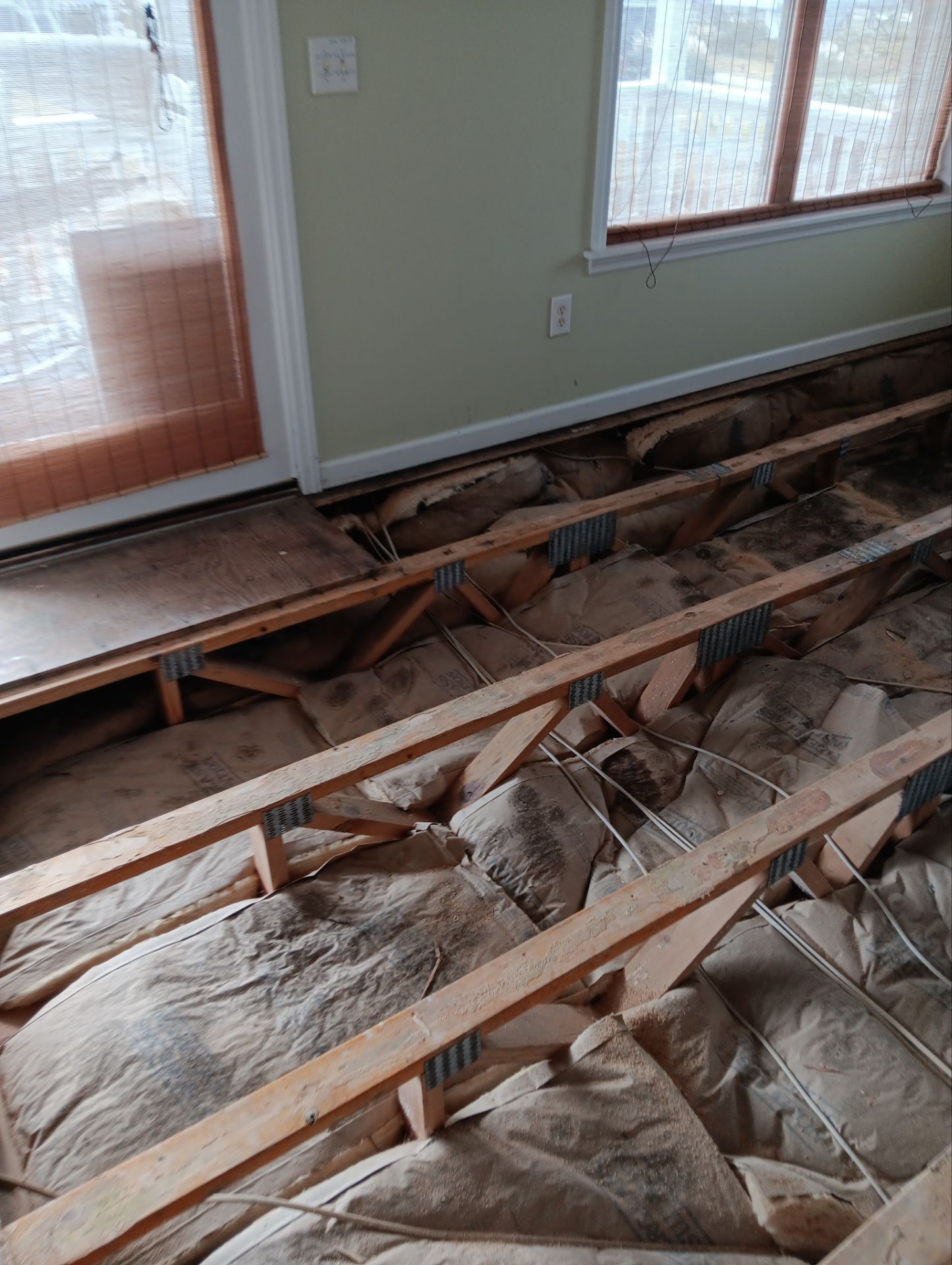 Caving Floor Flooring Repair in Oak Island, NC by RGR Construction and Roofing, LLC
