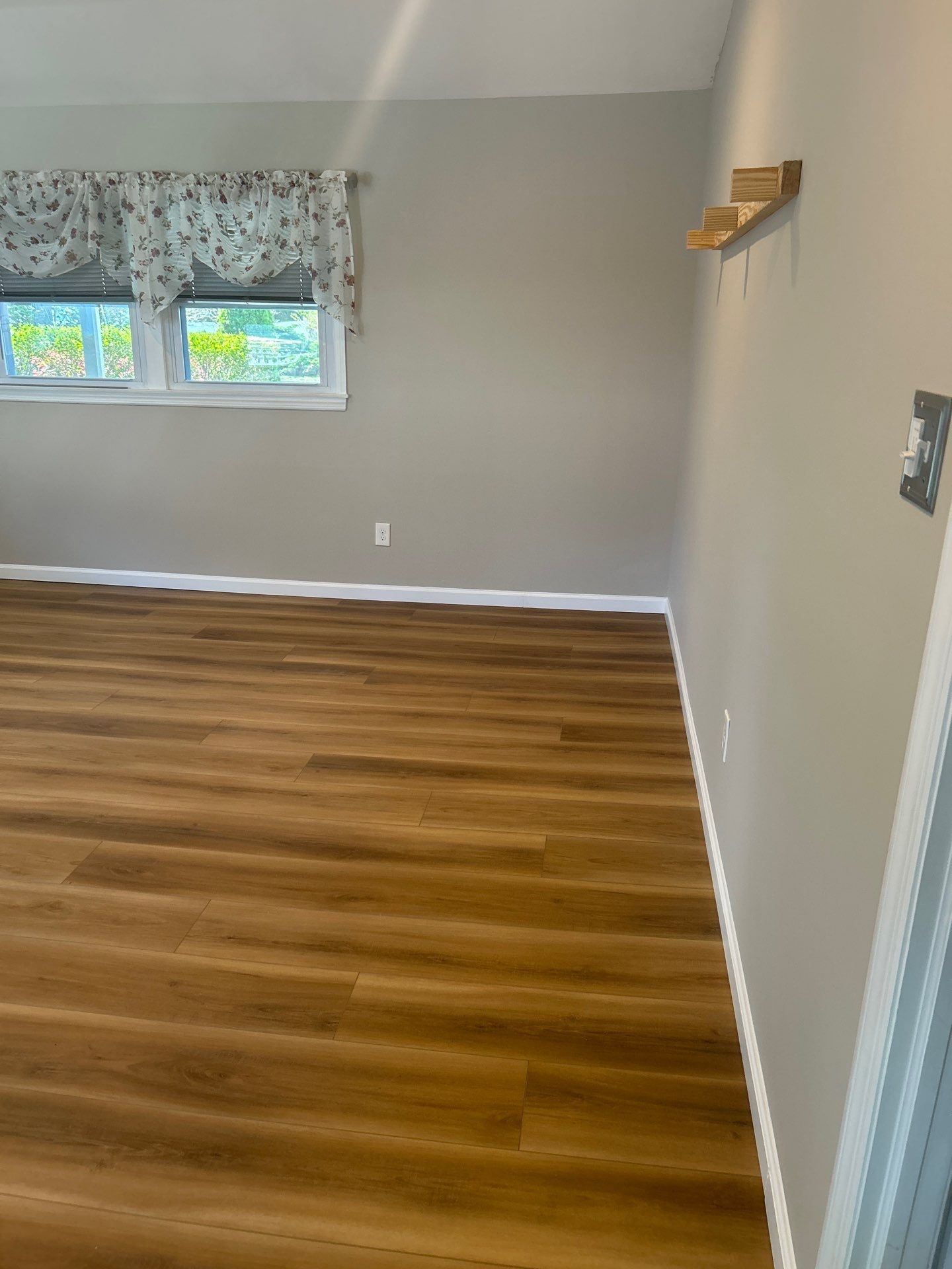 Water Damage Restoration and Full Laminate Floor Installation in Stony Brook by EMS Restoration Corp