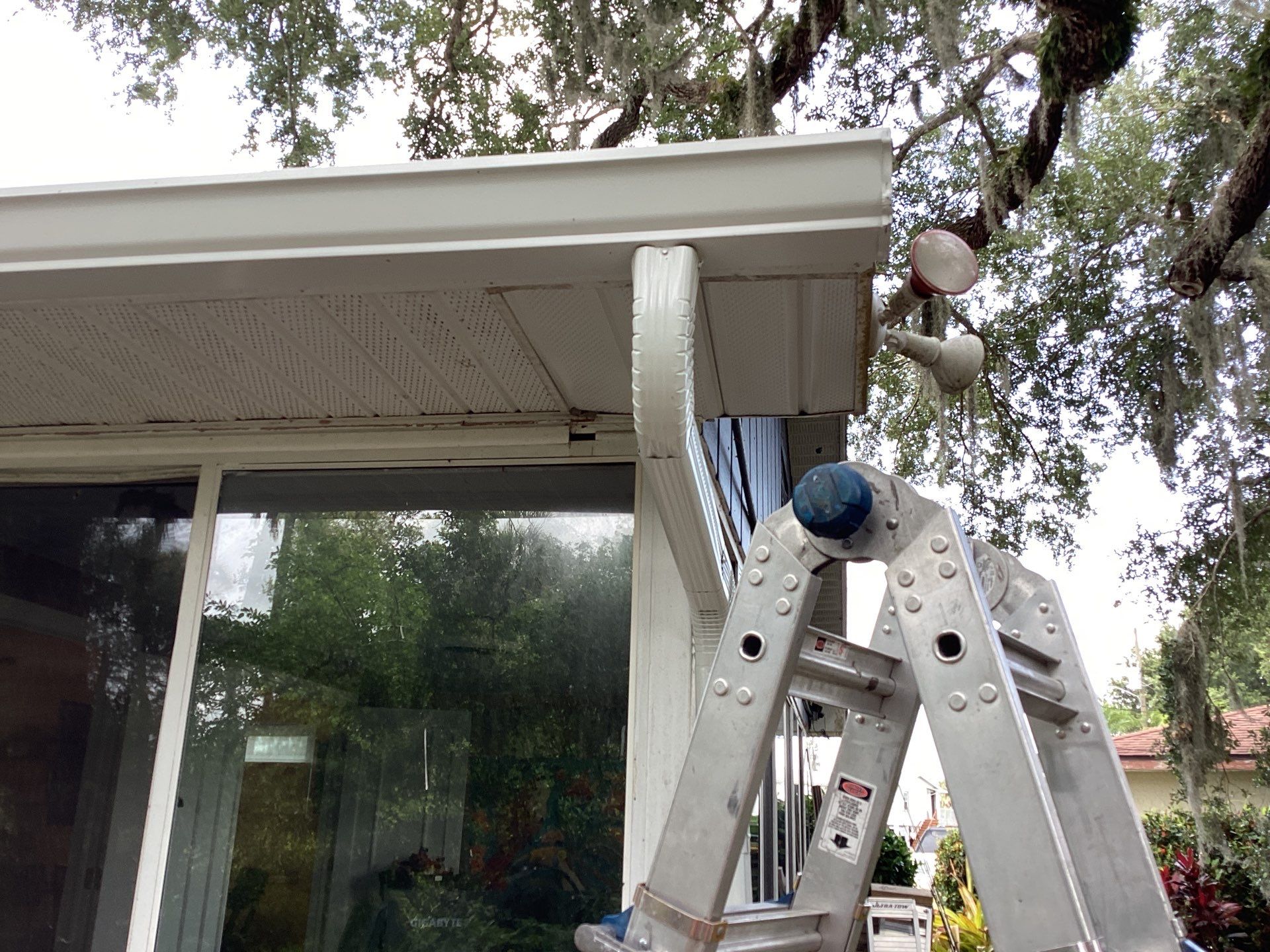 White 6-Inch Gutters and Leaf Guard Installation in Fort Myers FL by Gutter Professors